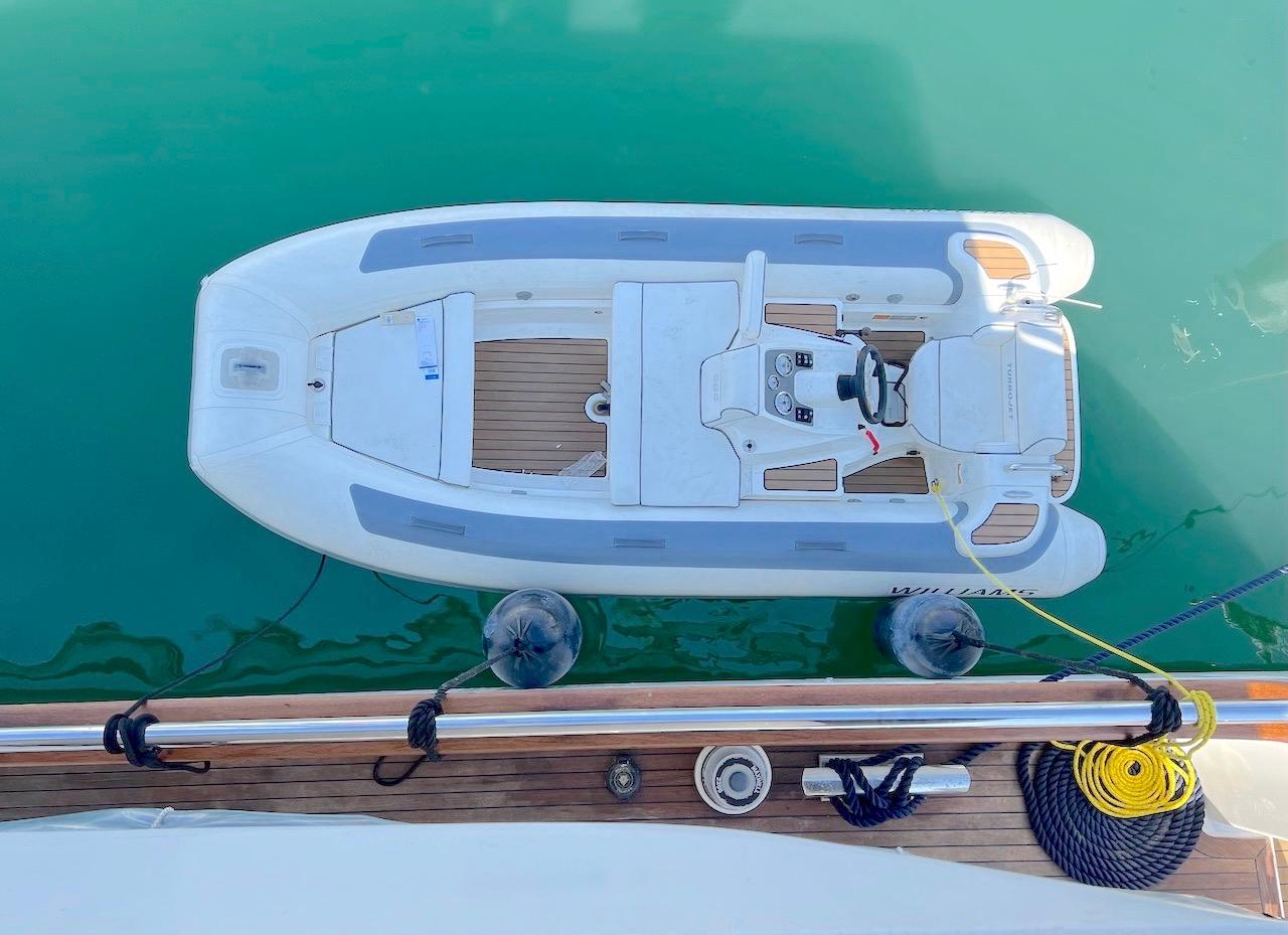 Top view of a 2001 Elegance 82 S boat docked on calm water.