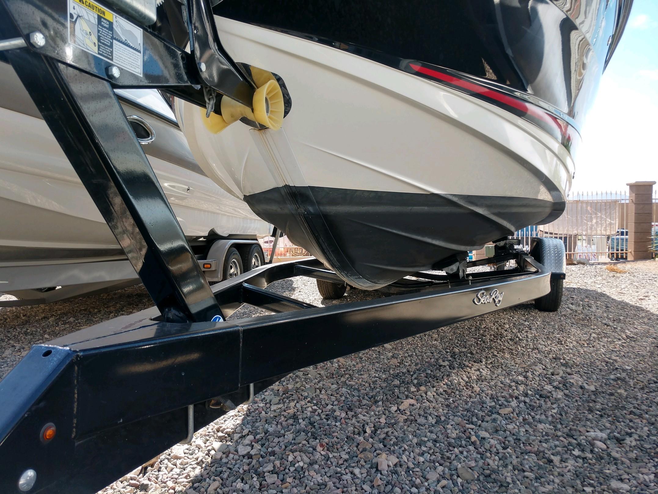 2018 Sea Ray SLX 280 boat on trailer, close-up view.