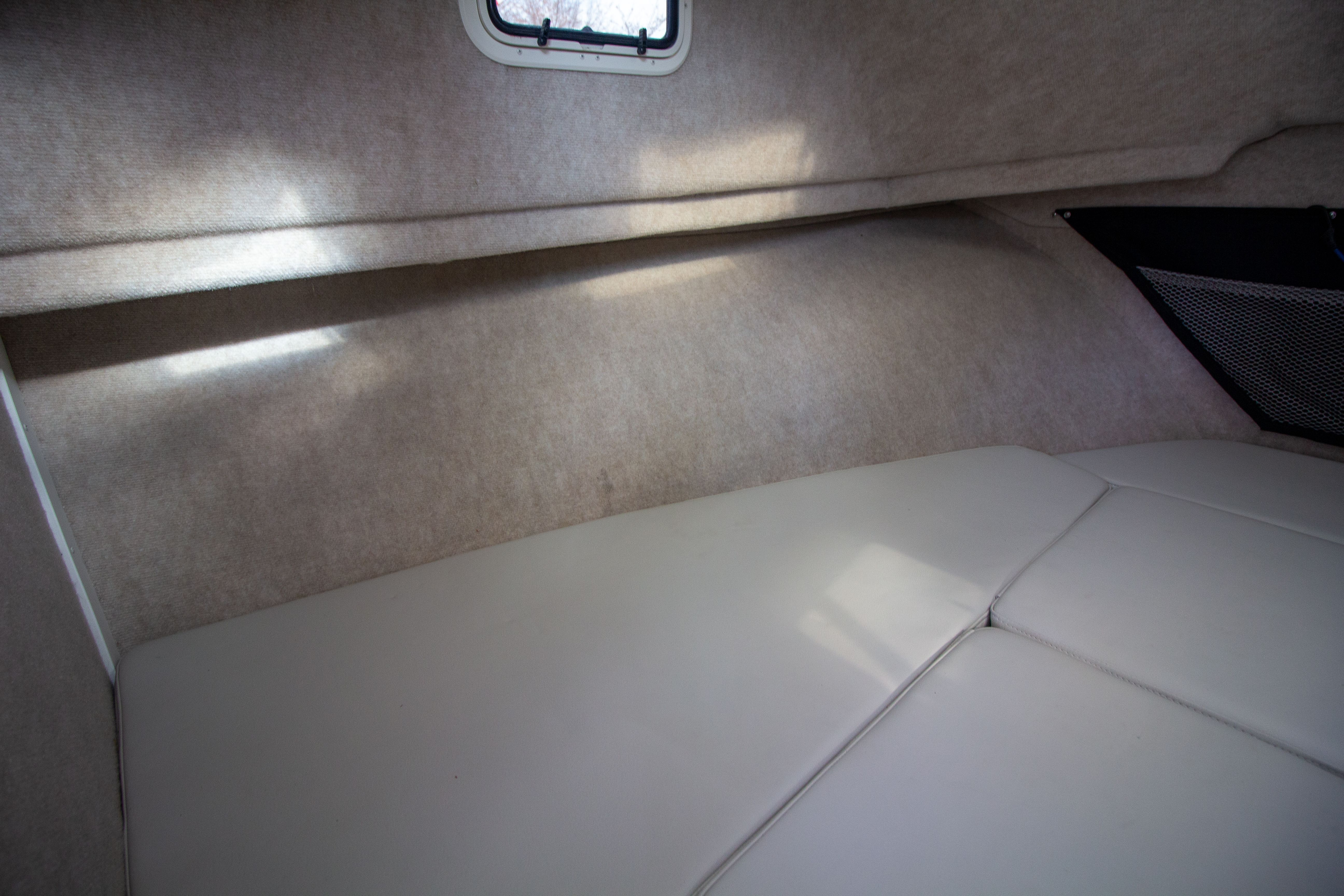 Interior of 2022 Parker 2520 XLD Sport Cabin with upholstery.