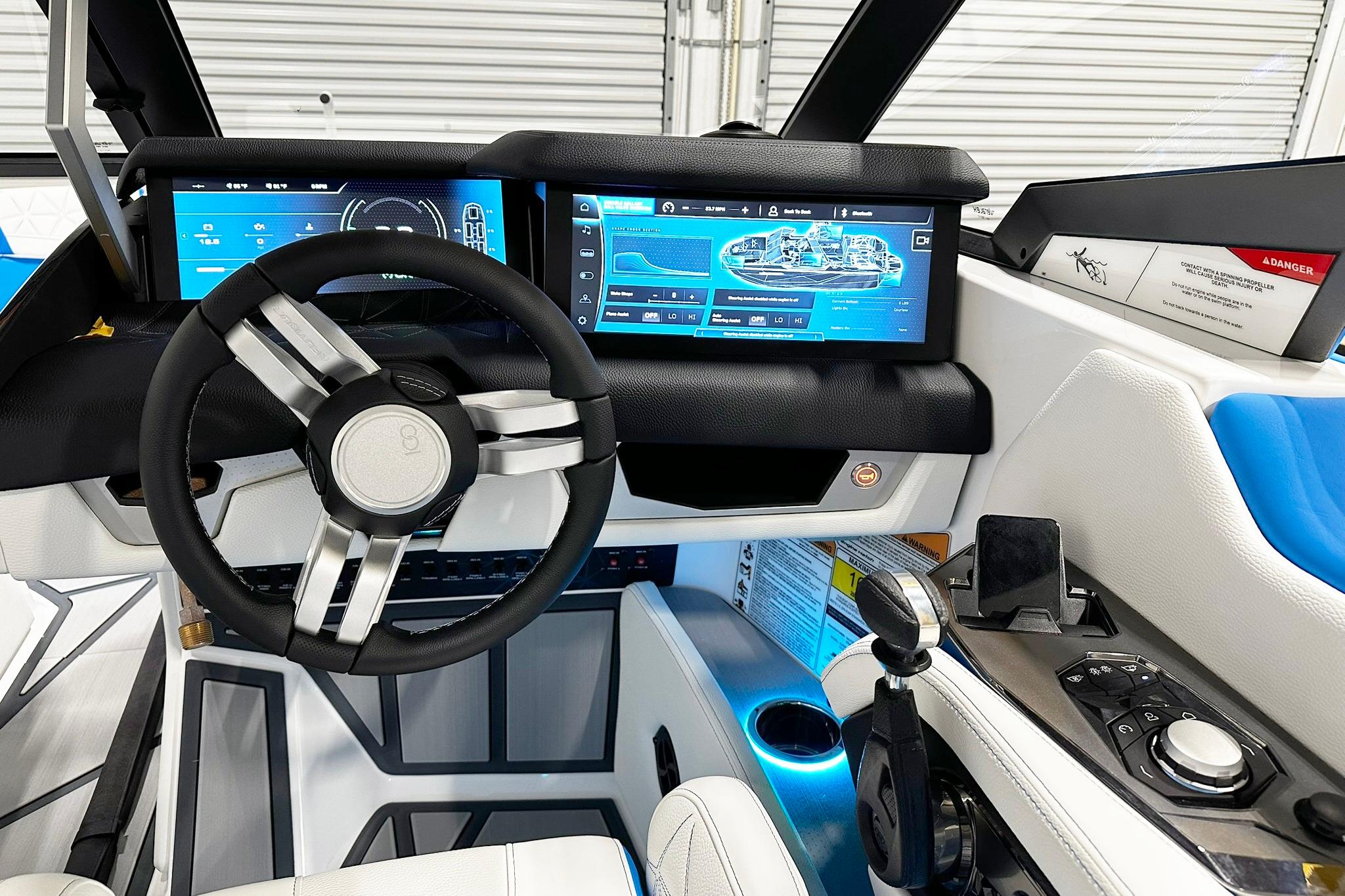 2025 Nautique Super Air Nautique G23 Paragon cockpit with advanced digital displays and controls.