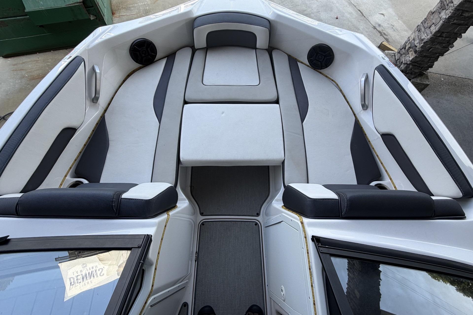 2022 Yamaha Boats AR195 interior with sleek seating and modern design.