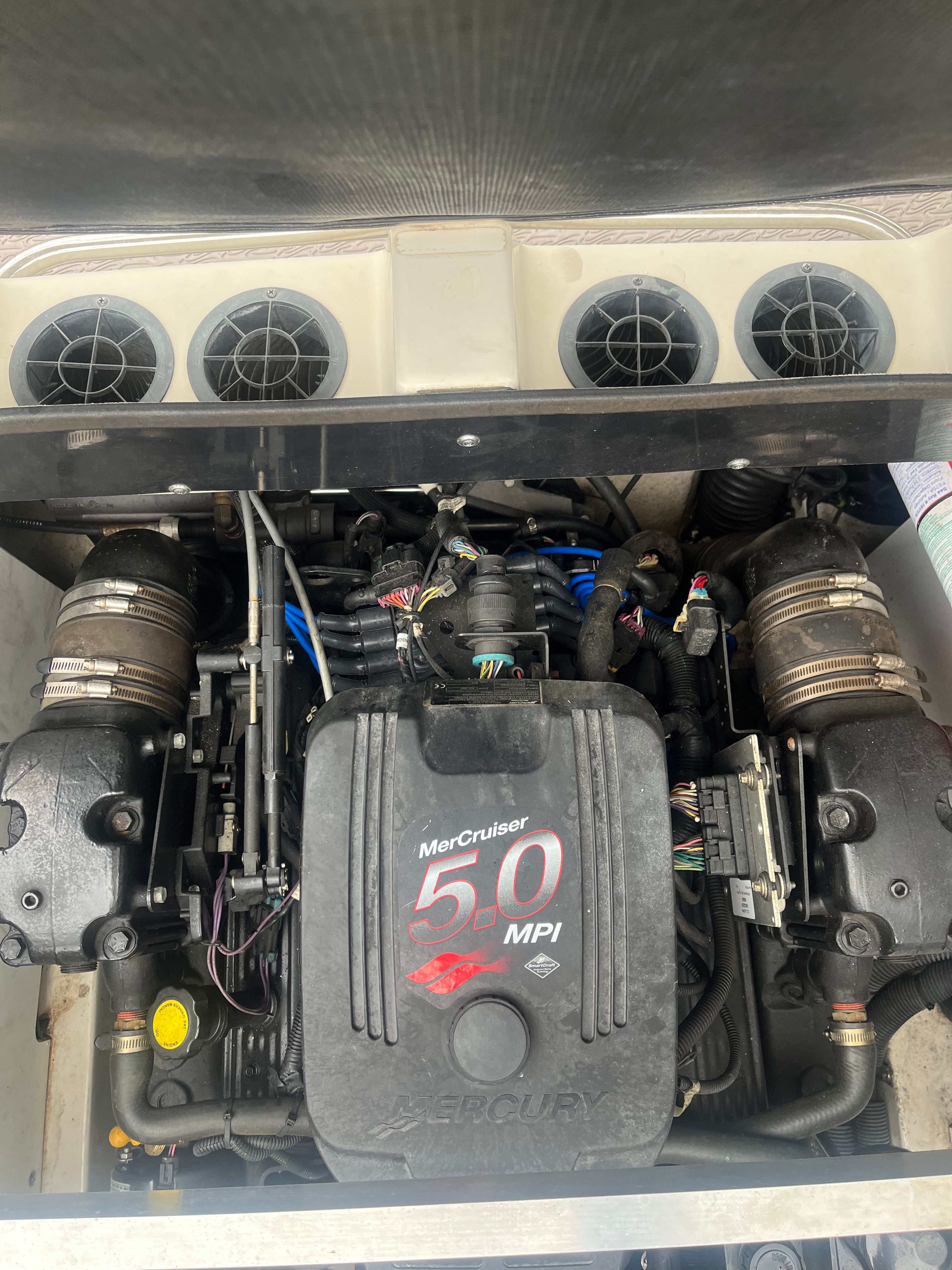 Engine compartment of a 2007 Sea Ray 210 Select with a MerCruiser 5.0 MPI engine.