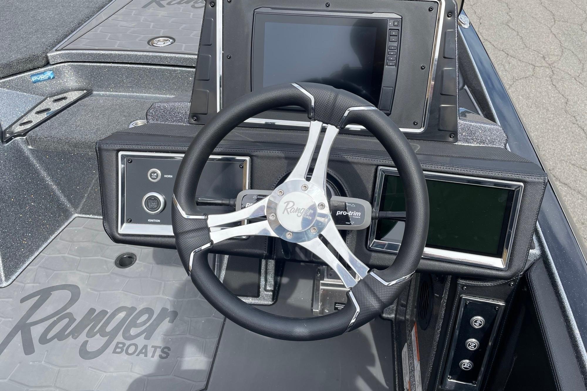 2026 Ranger Z520R boat dashboard with steering wheel and digital displays.