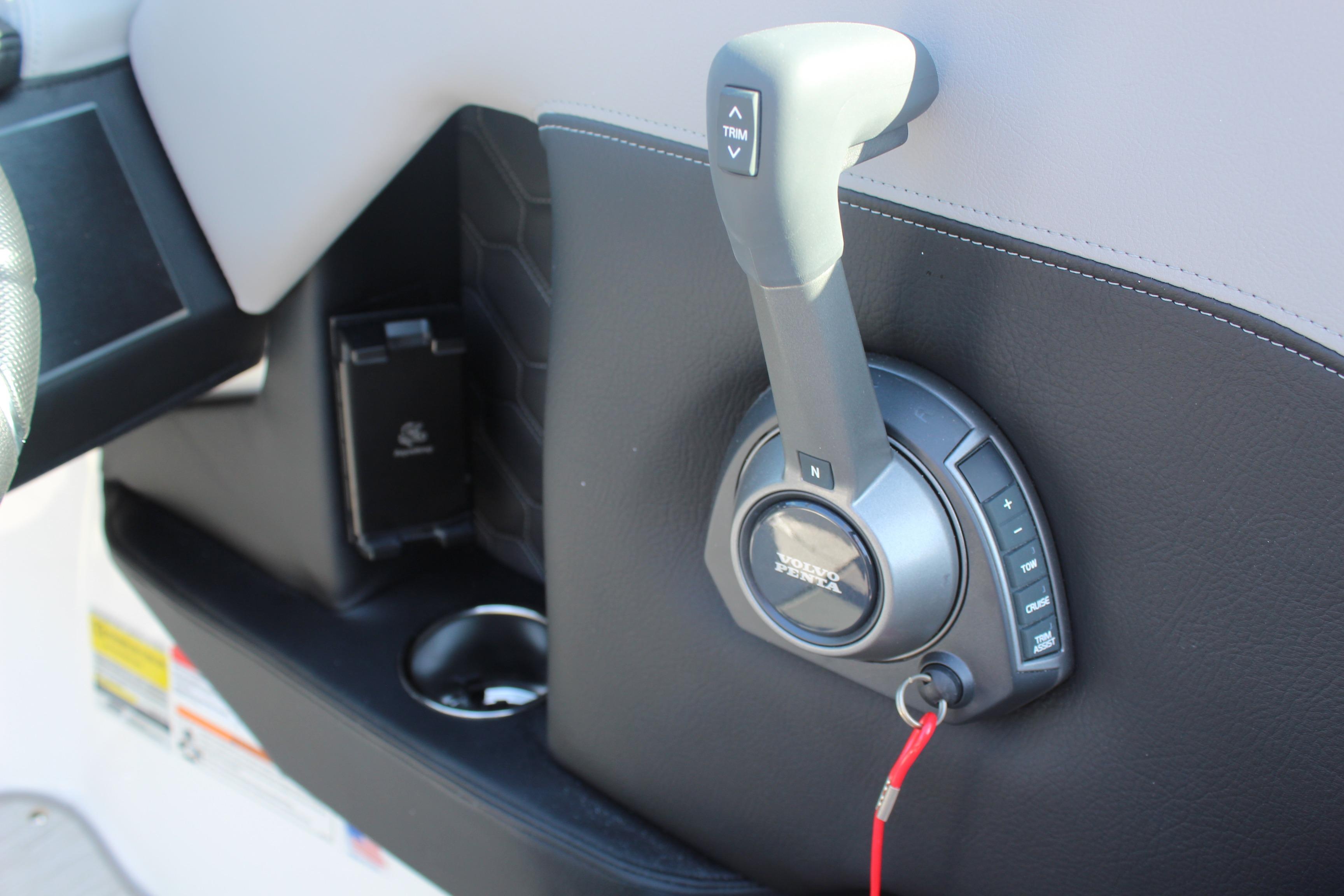 2026 Four Winns H4 boat throttle control with trim and cruise buttons.