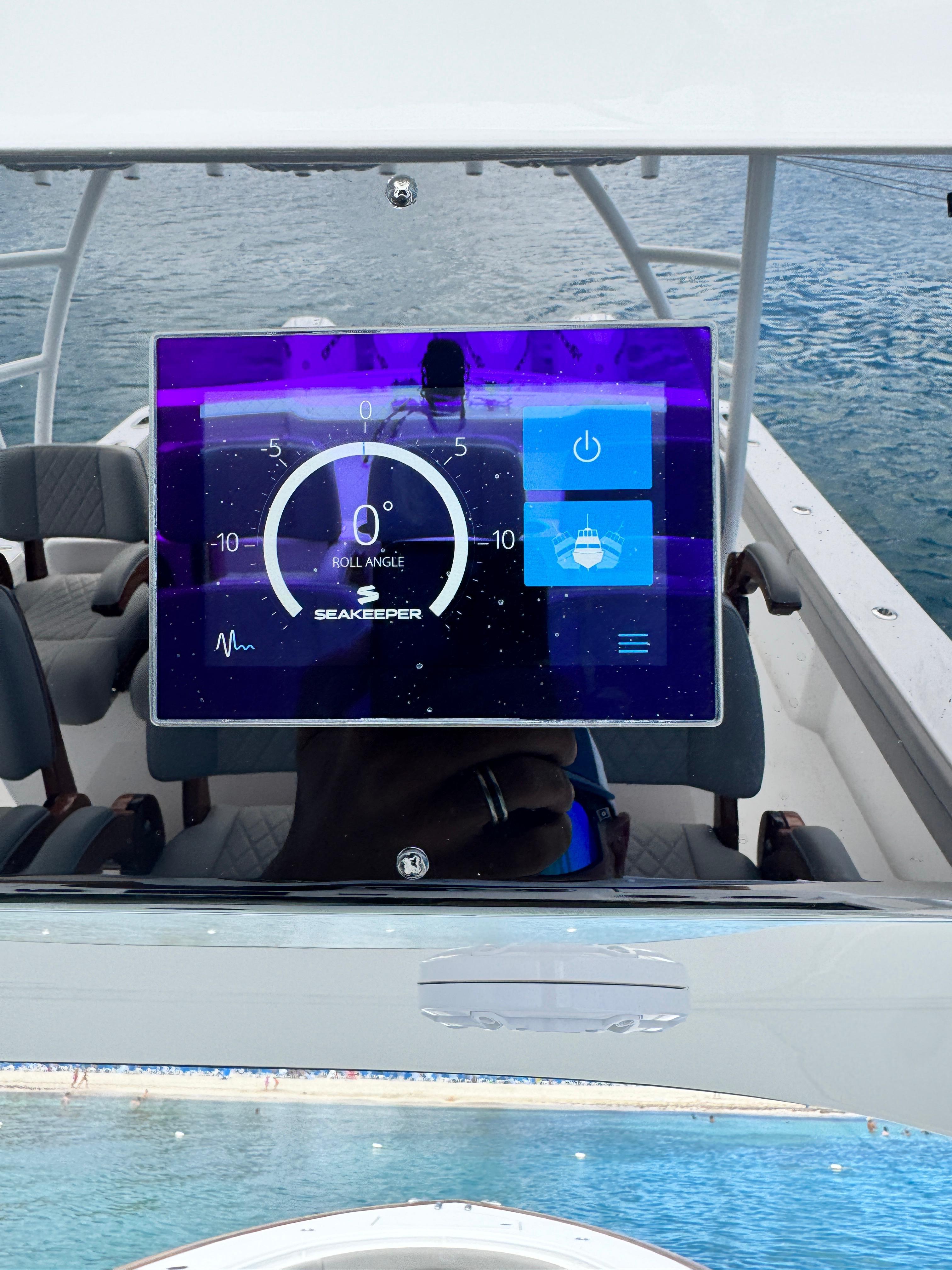 2023 Valhalla Boatworks V-46 dashboard with digital display on water.