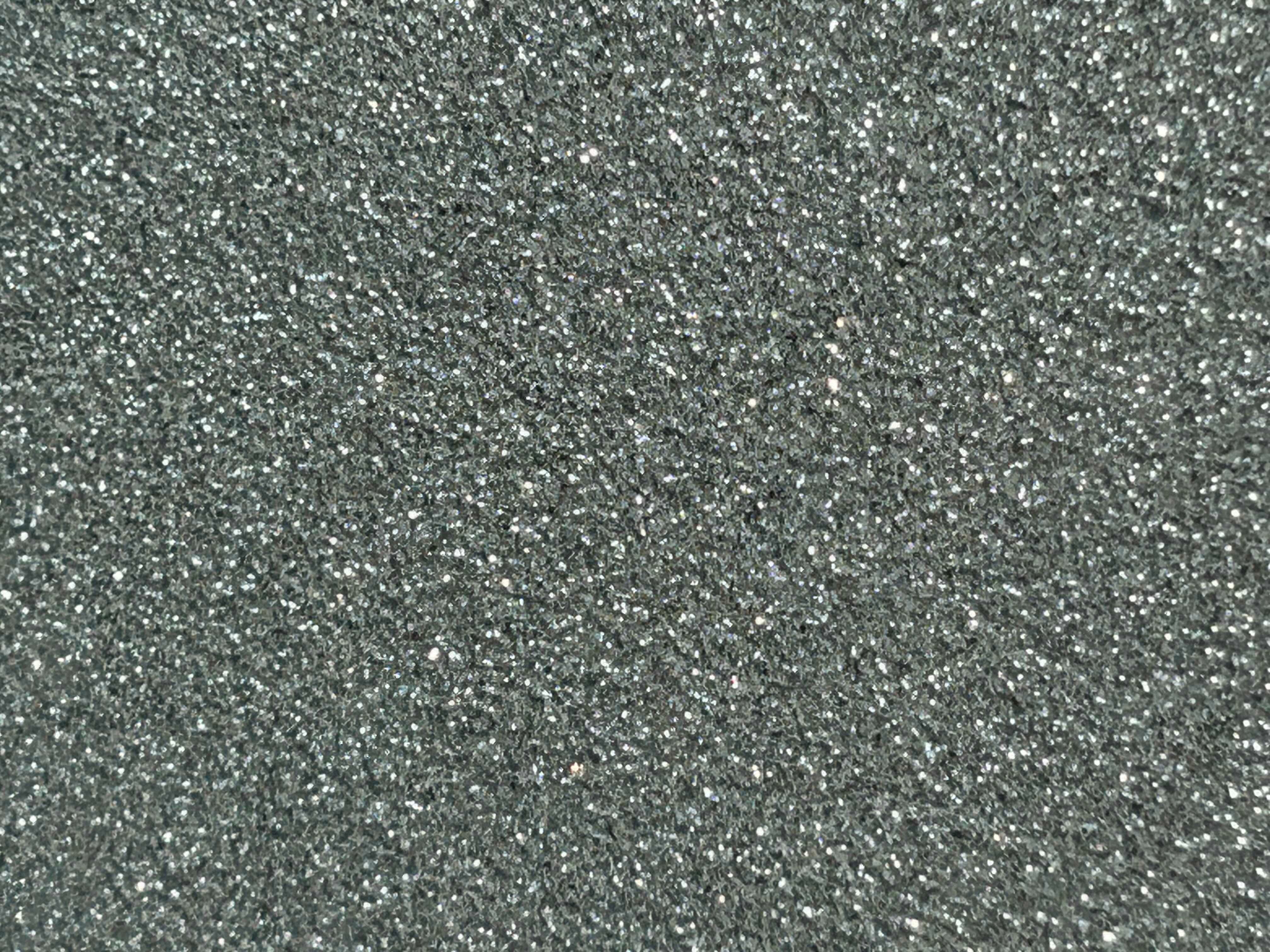 Close-up of a textured gray surface.