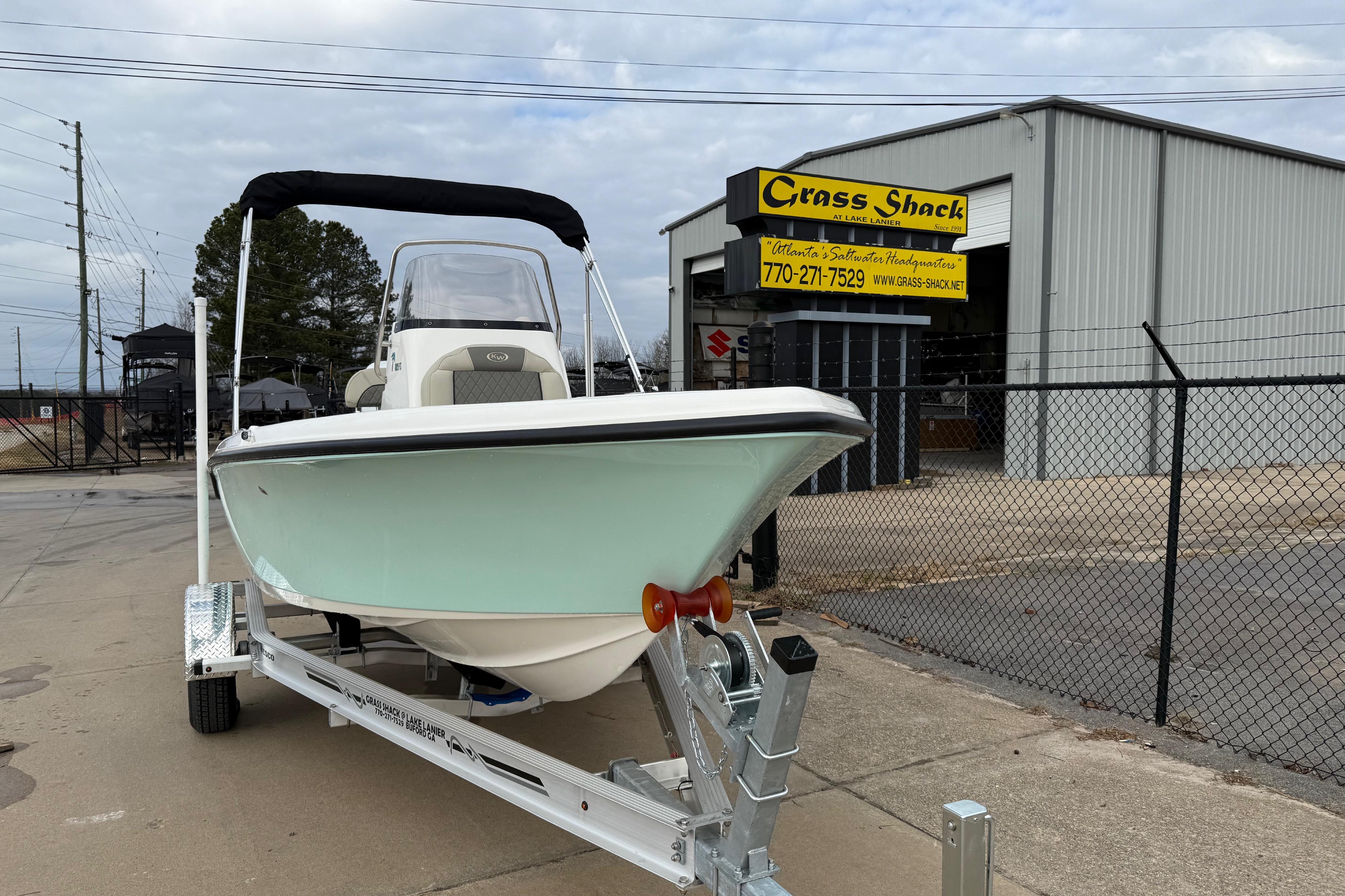 2026 Key West 189 FS boat on trailer outside Grass Shack dealership.