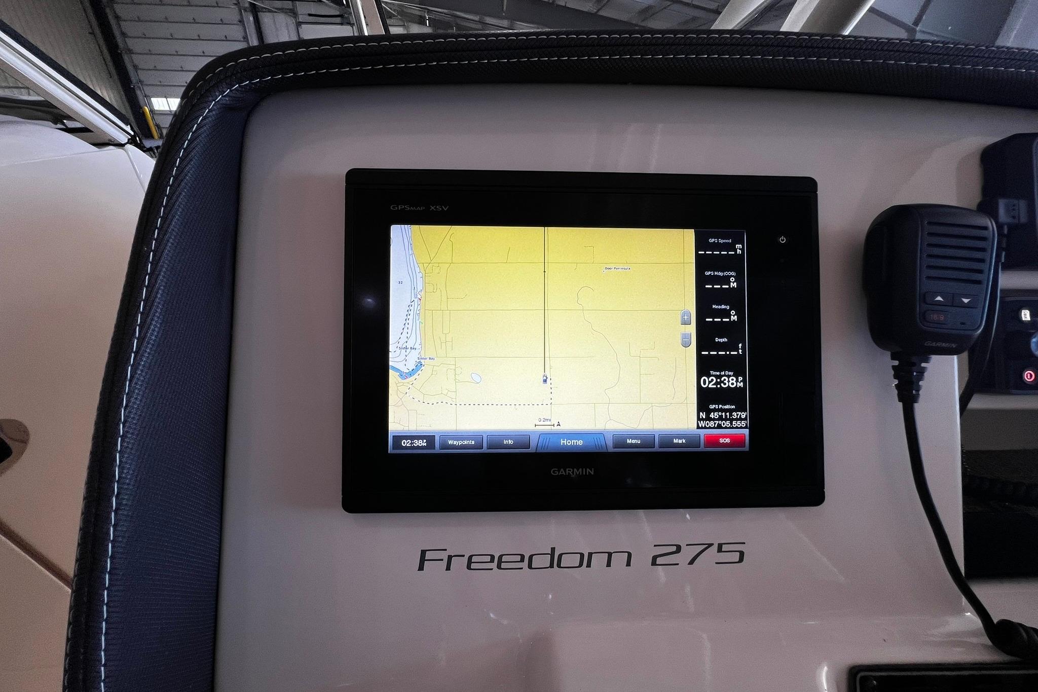 Garmin GPS display on 2014 Grady-White Freedom 275 boat dashboard.