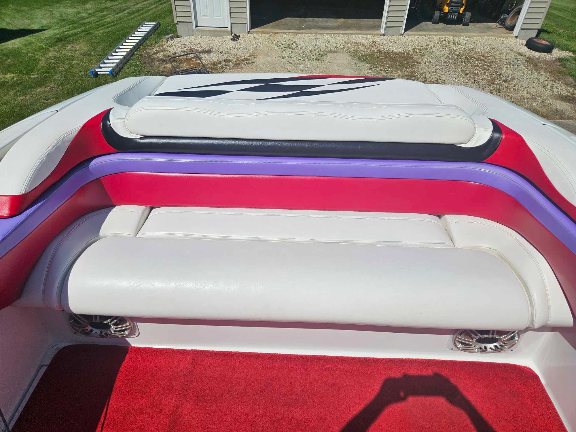 Interior of a 1997 Baja 38 Special Boss boat with colorful upholstery.