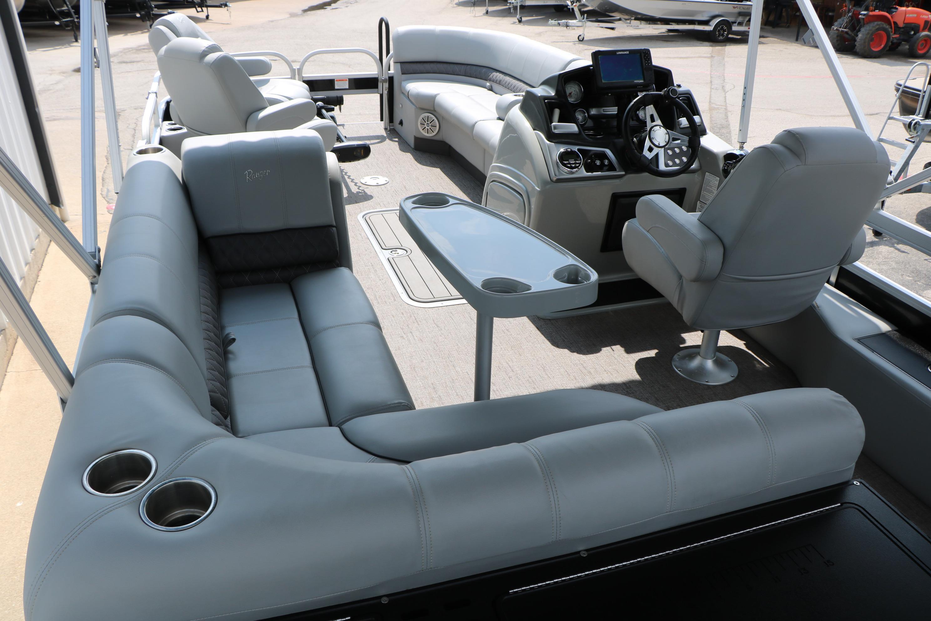 2021 Ranger 223FC boat interior with plush seating and modern helm controls.