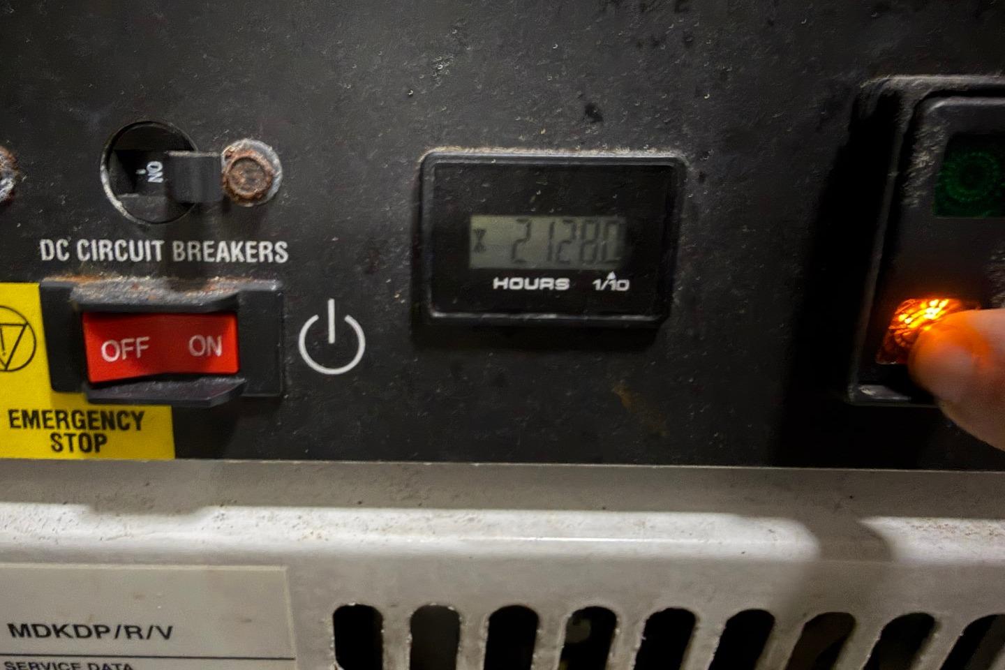 Control panel of a 2017 Azimut Fly 72 yacht, showing circuit breakers and hour meter.