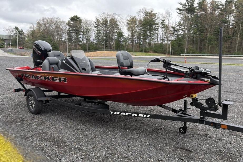 2026 Tracker Pro Team 175 boat on trailer, red exterior, parked outdoors.