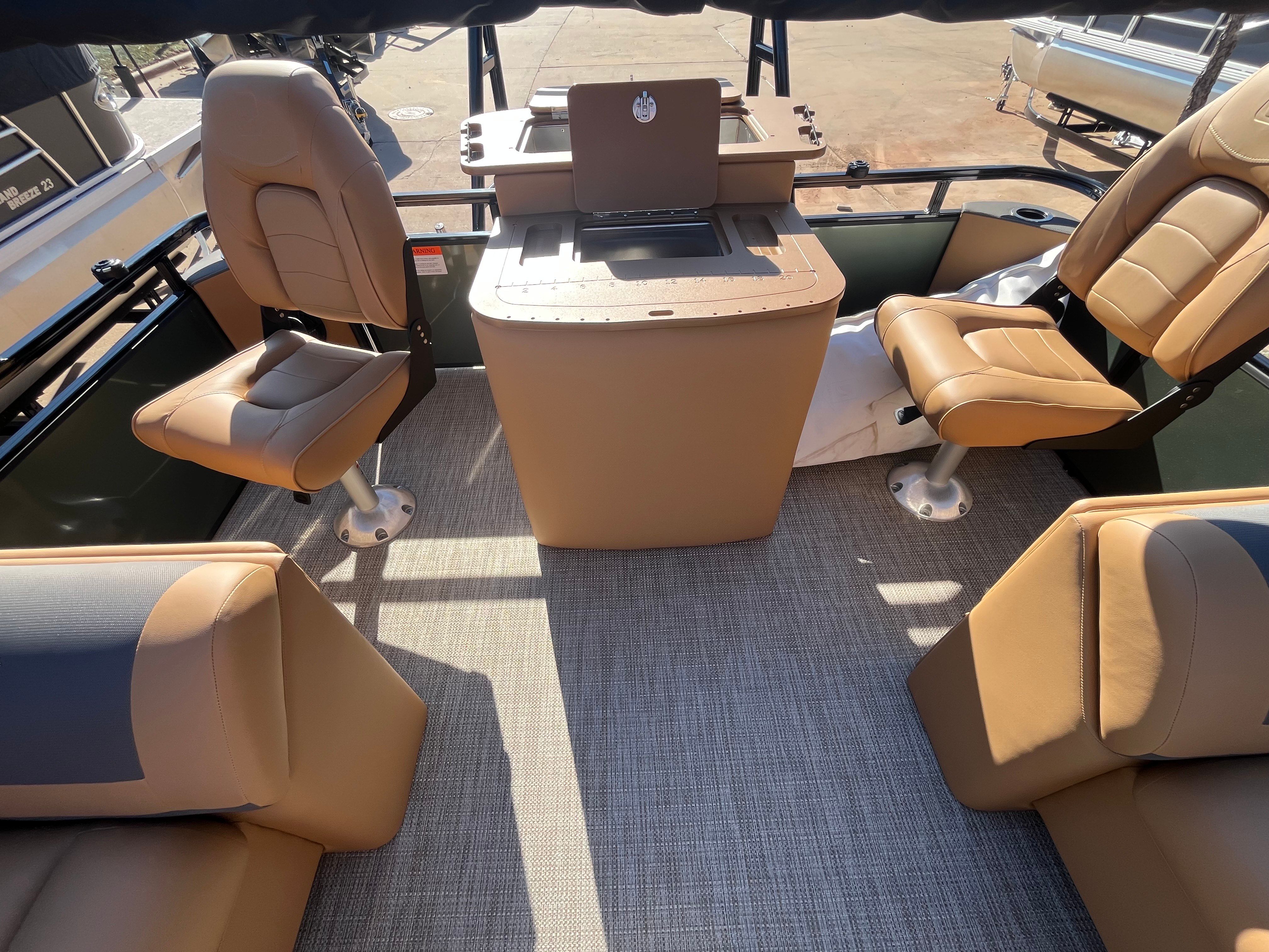 Interior of 2026 Landau Alure 21CC Fish with beige seating.