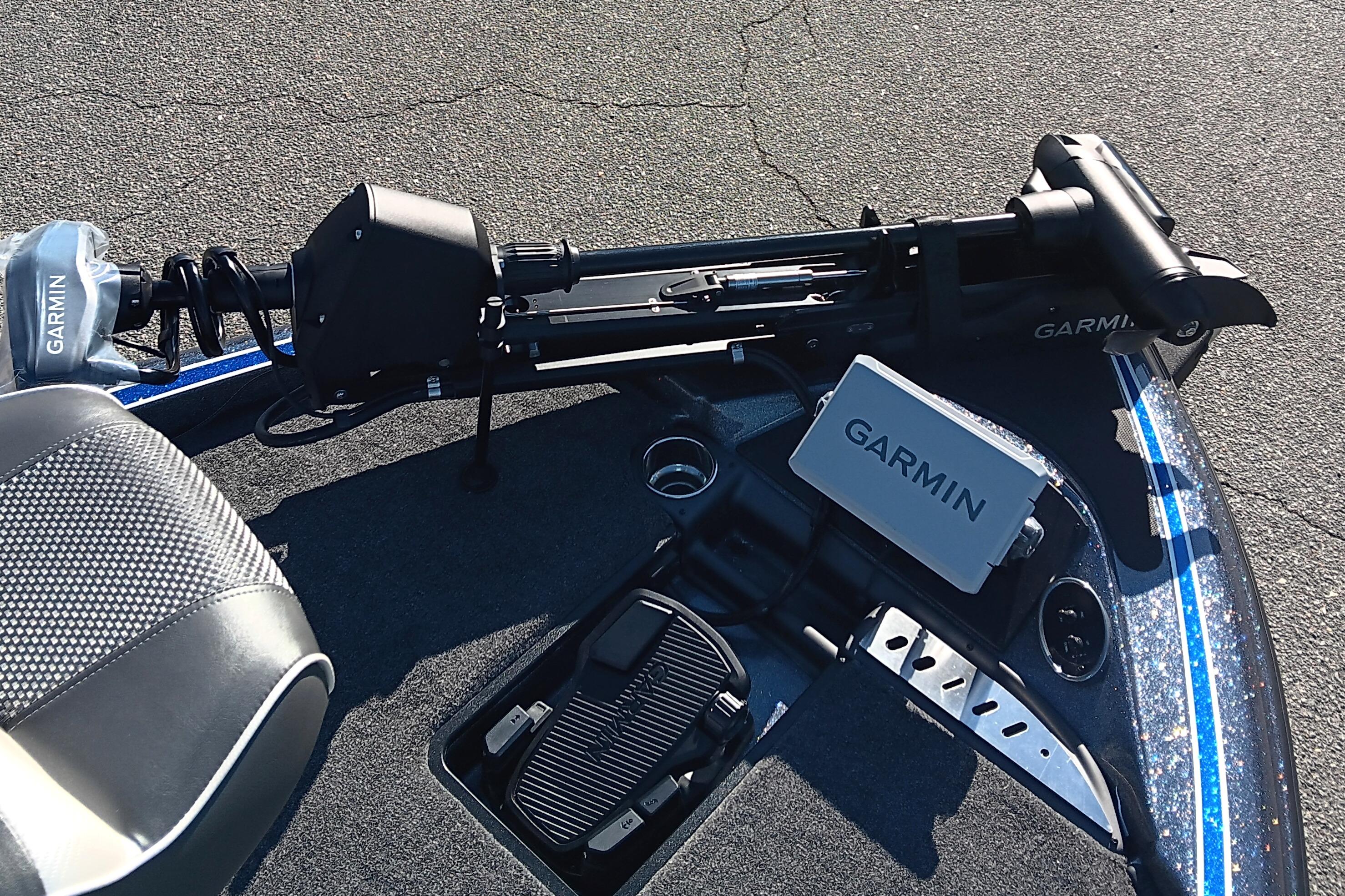 2026 Triton 18 TrX boat with Garmin equipment on deck.