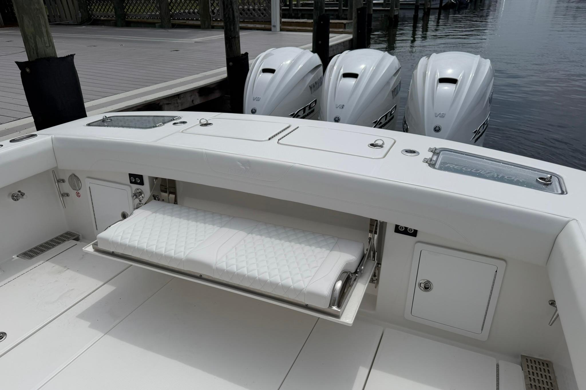2026 Regulator 37 boat with triple V8 engines at dockside.