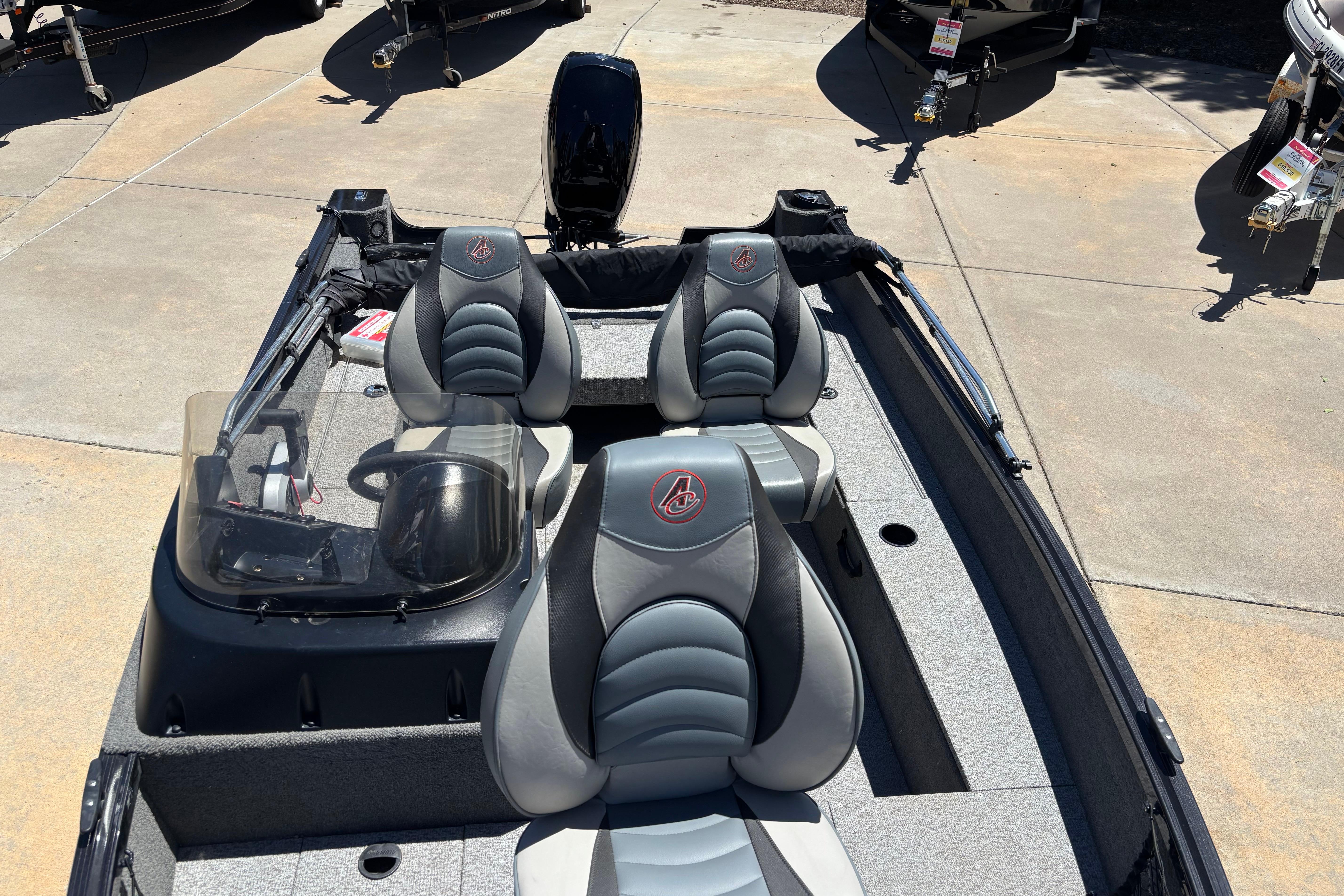 2021 Alumacraft Classic 165 boat interior with dual seats and steering console.