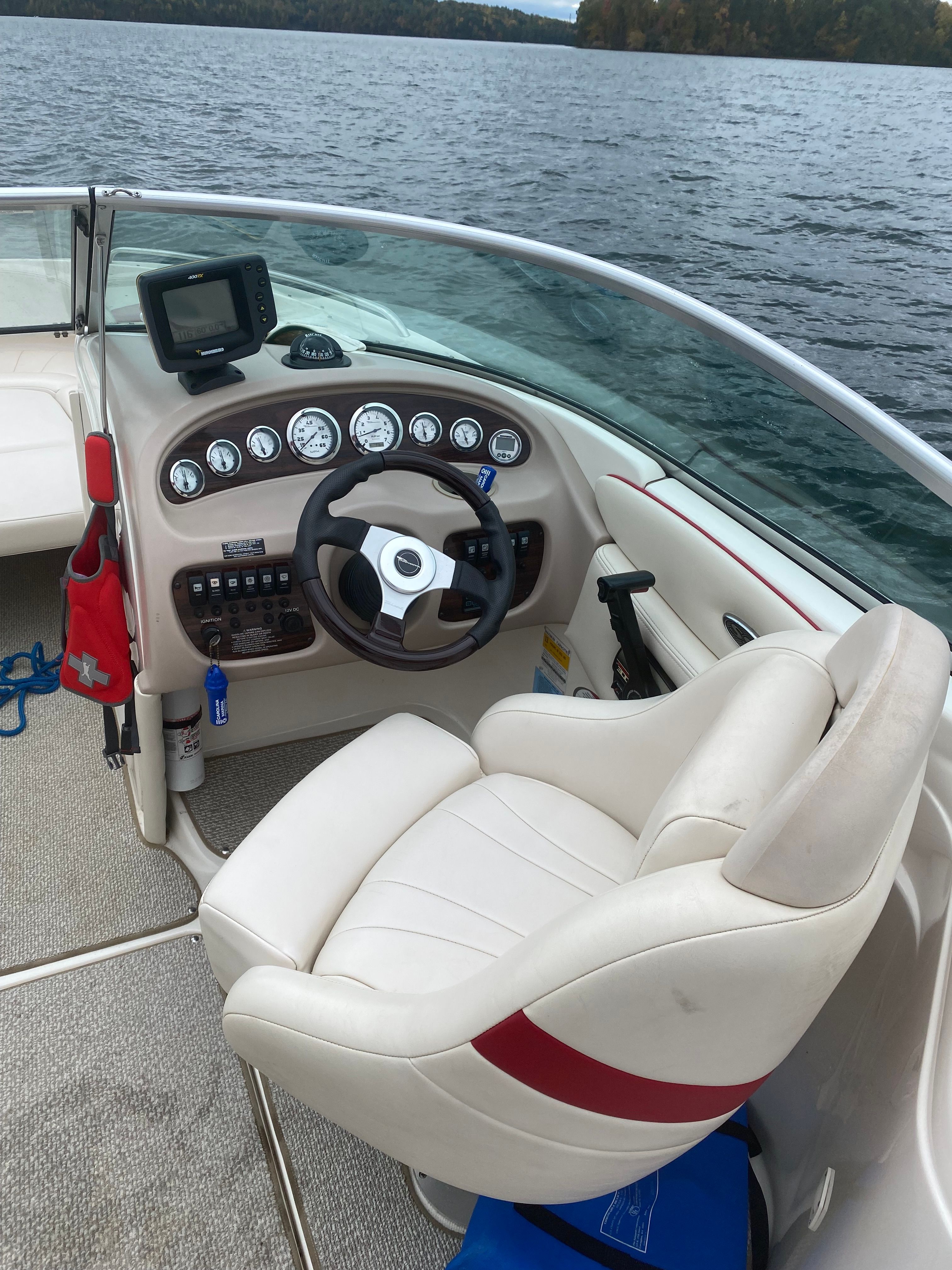 Interior of a 2000 Chaparral 230 SSi boat on the water.
