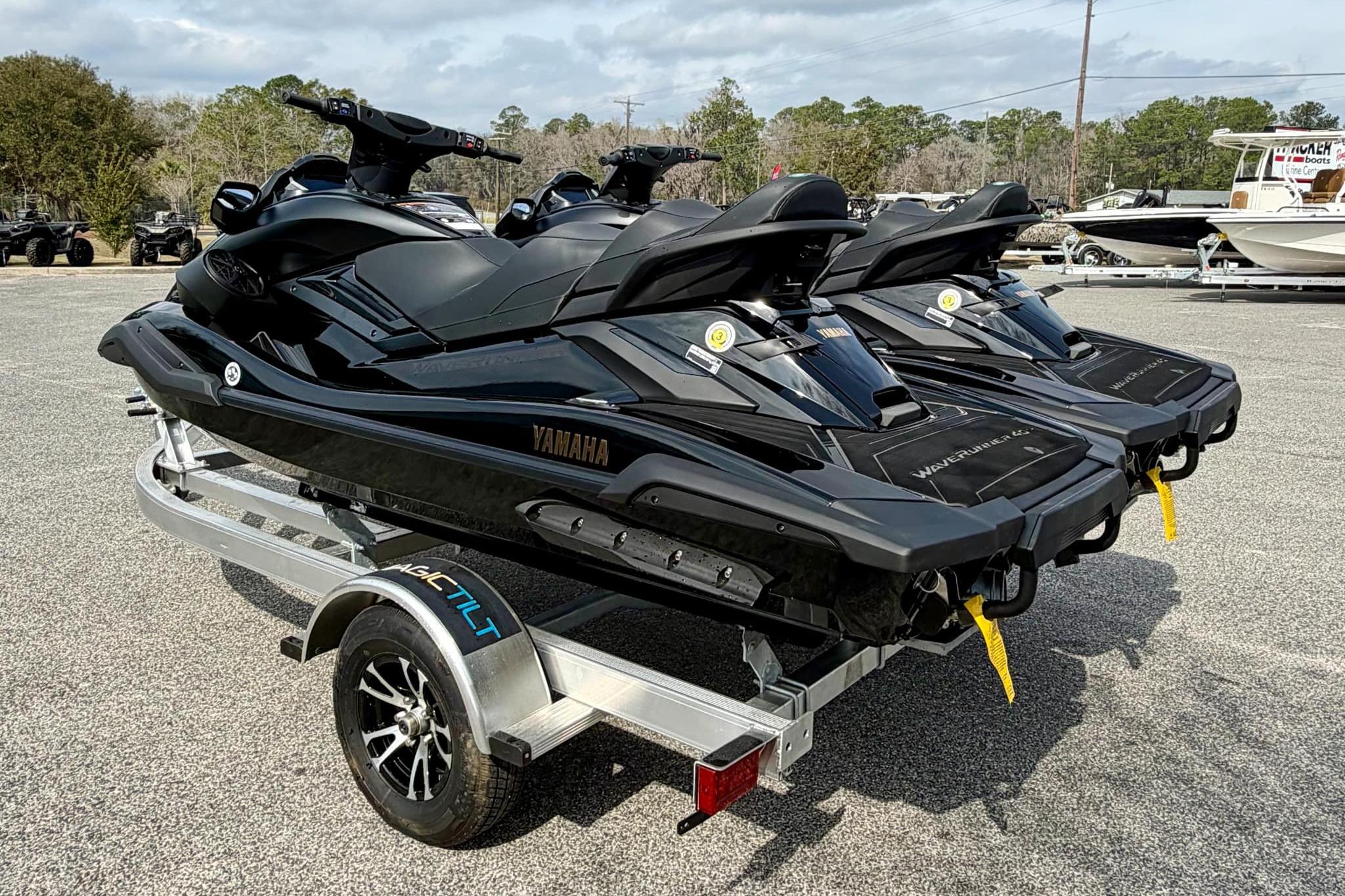 2026 Yamaha WaveRunner FX Limited SVHO jet skis on a trailer, parked outdoors.