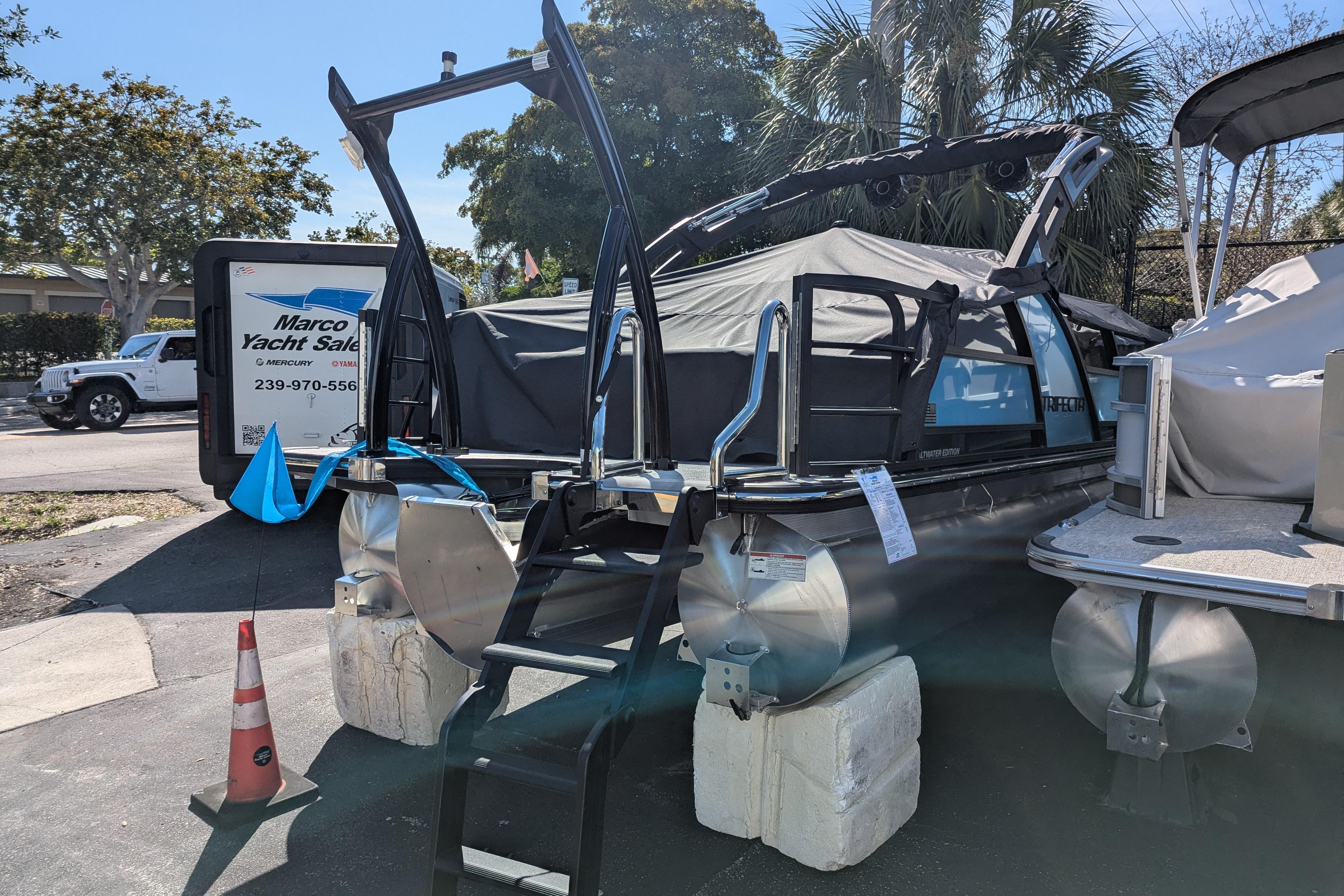2026 Trifecta 23SB2 SS pontoon boat displayed at yacht sales lot.