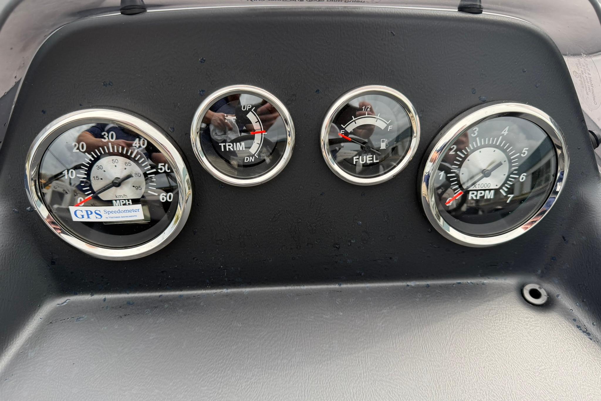 Dashboard of 2026 Lowe LS 190 boat with speedometer, trim, fuel, and RPM gauges.
