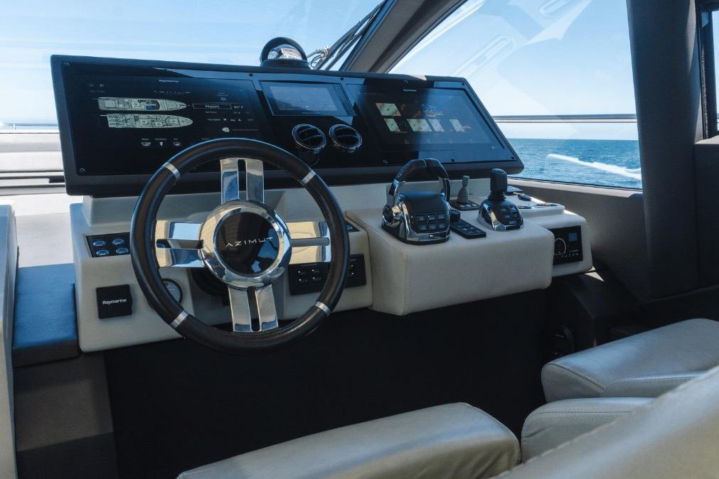 Cockpit of 2020 Azimut 60 yacht with modern steering and control panels.