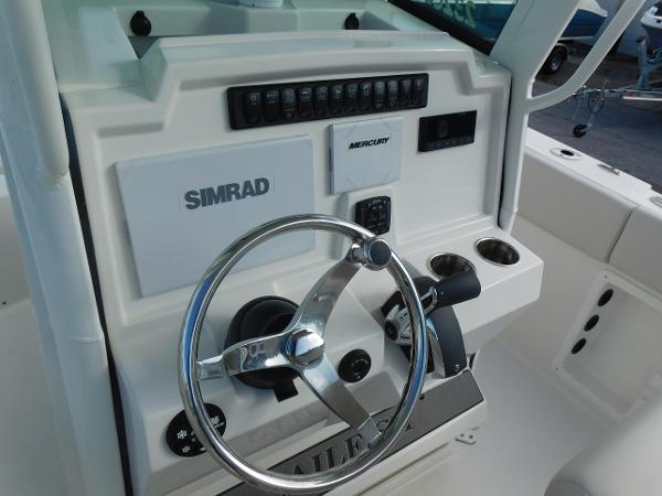 2025 Sailfish 232 CC boat console with Simrad and Mercury controls.