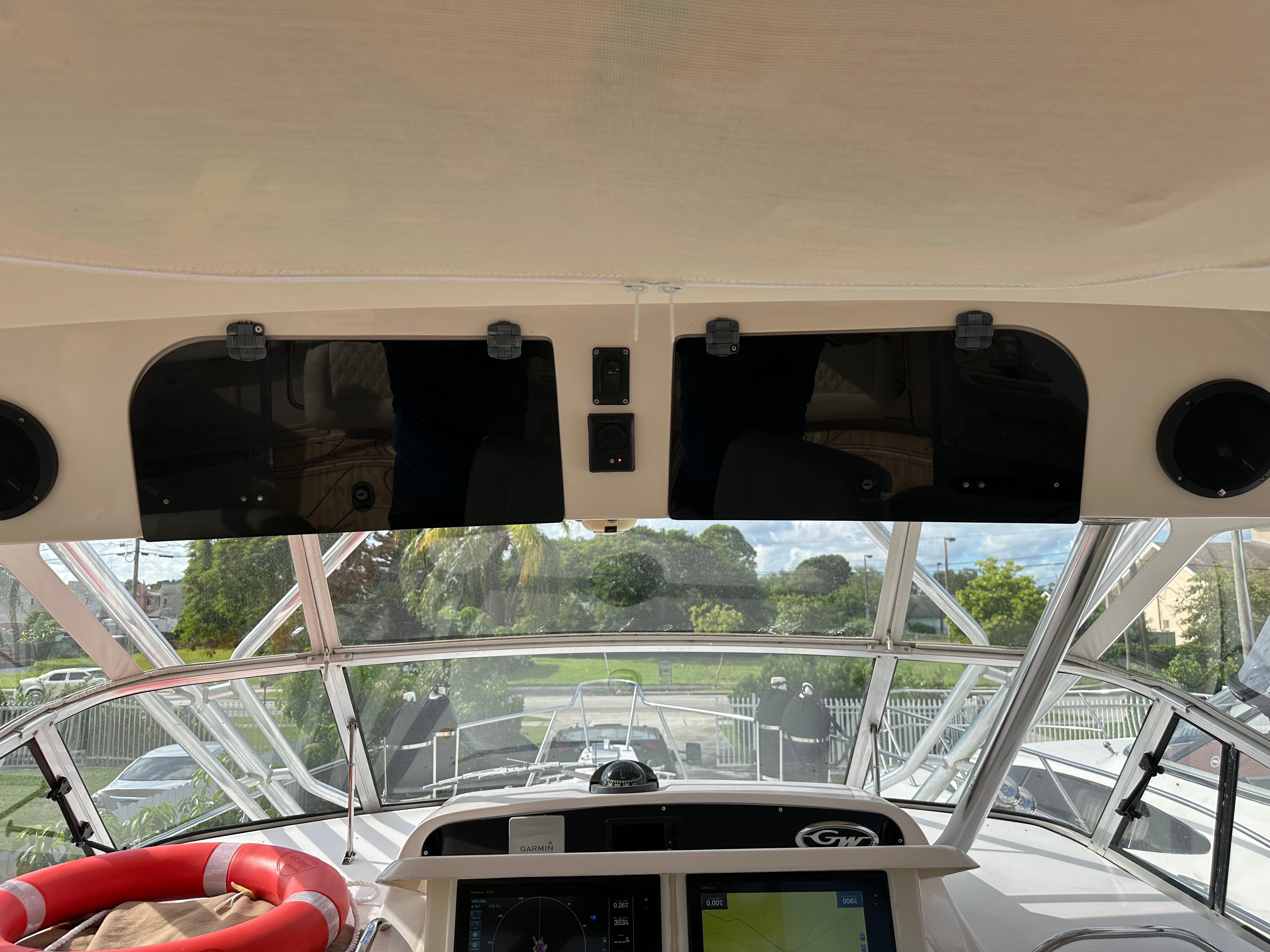 Interior view of a Grady-White Express 330 boat with helm and electronics.