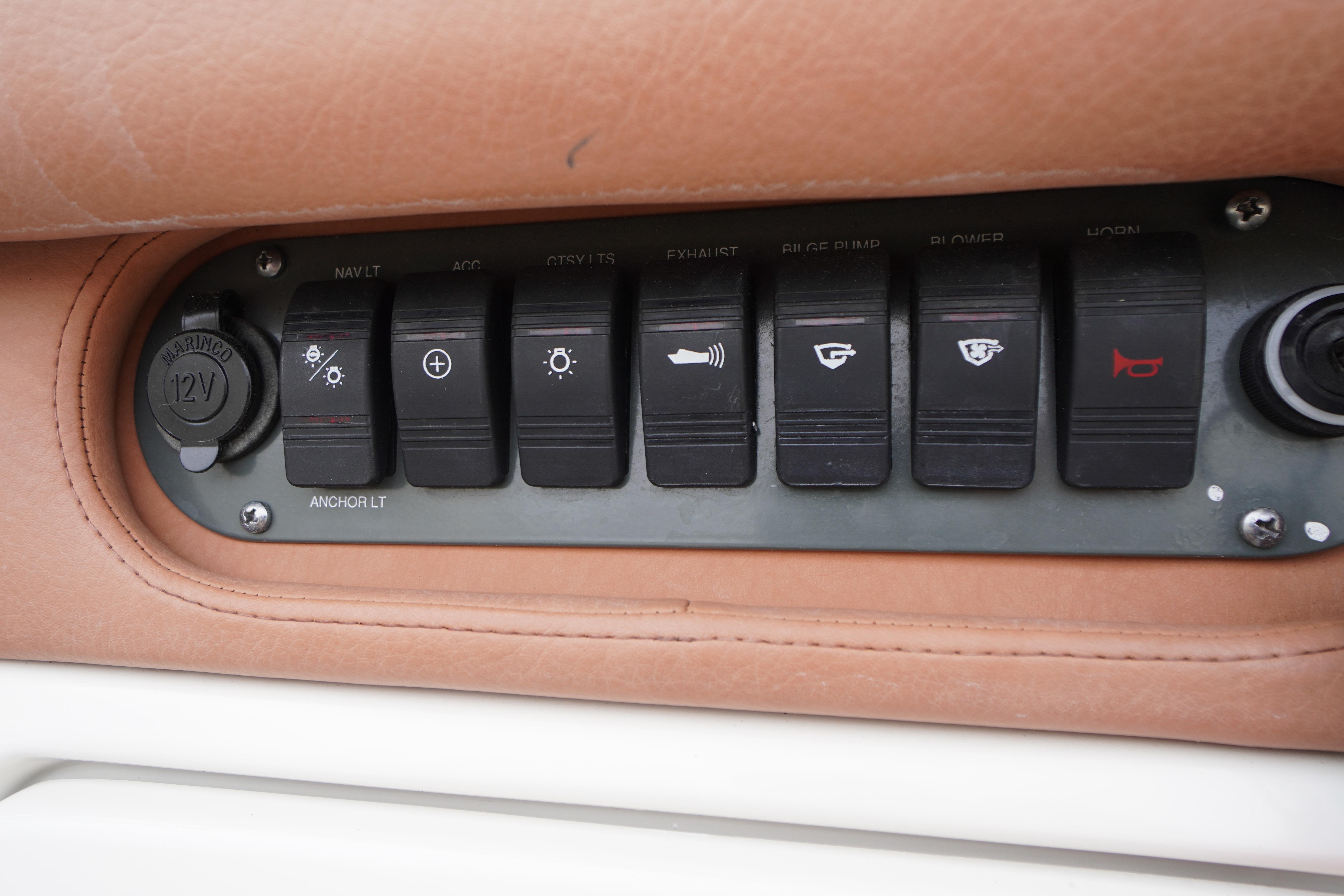 Control panel of a 2005 Chris Craft Speedster Heritage boat with labeled switches.