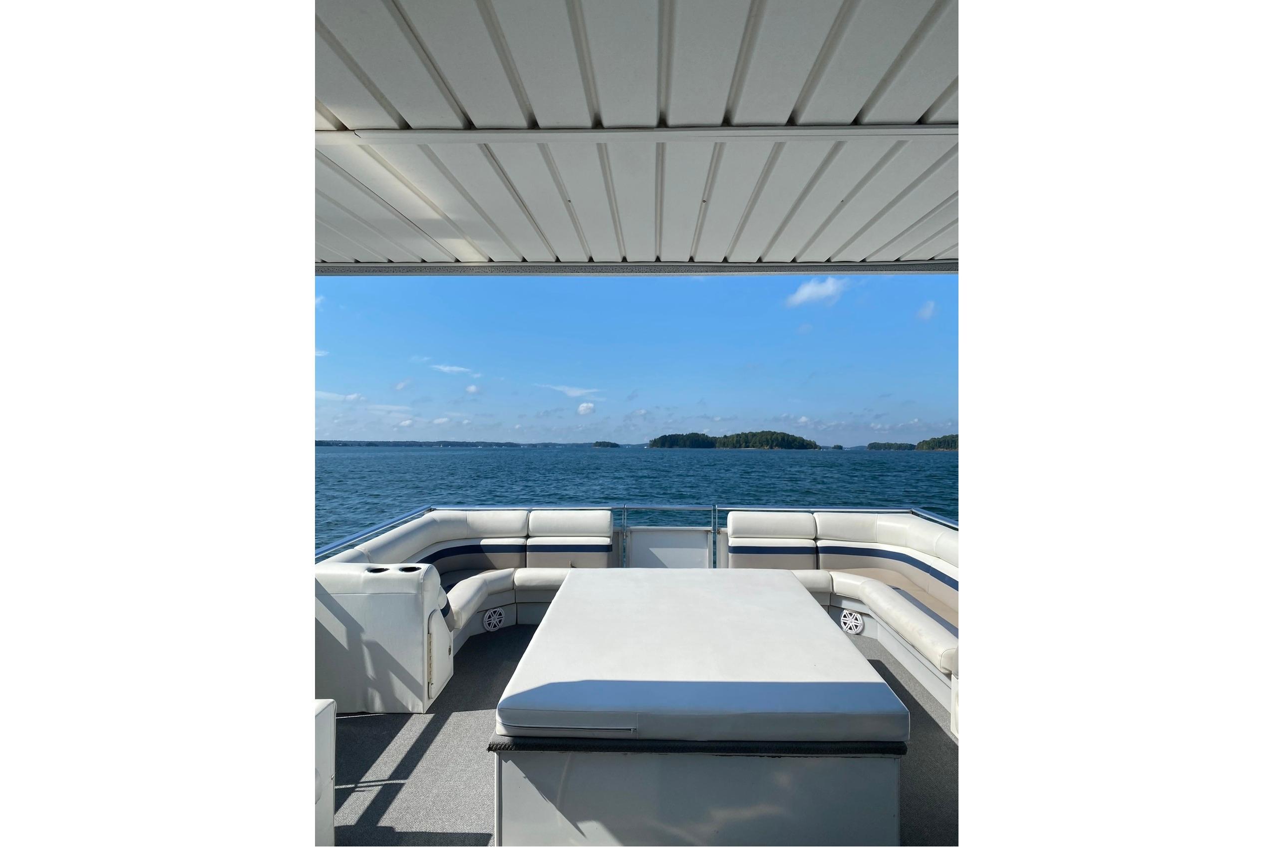 2008 Destination Yachts 45X14 boat interior with lake view and seating area.