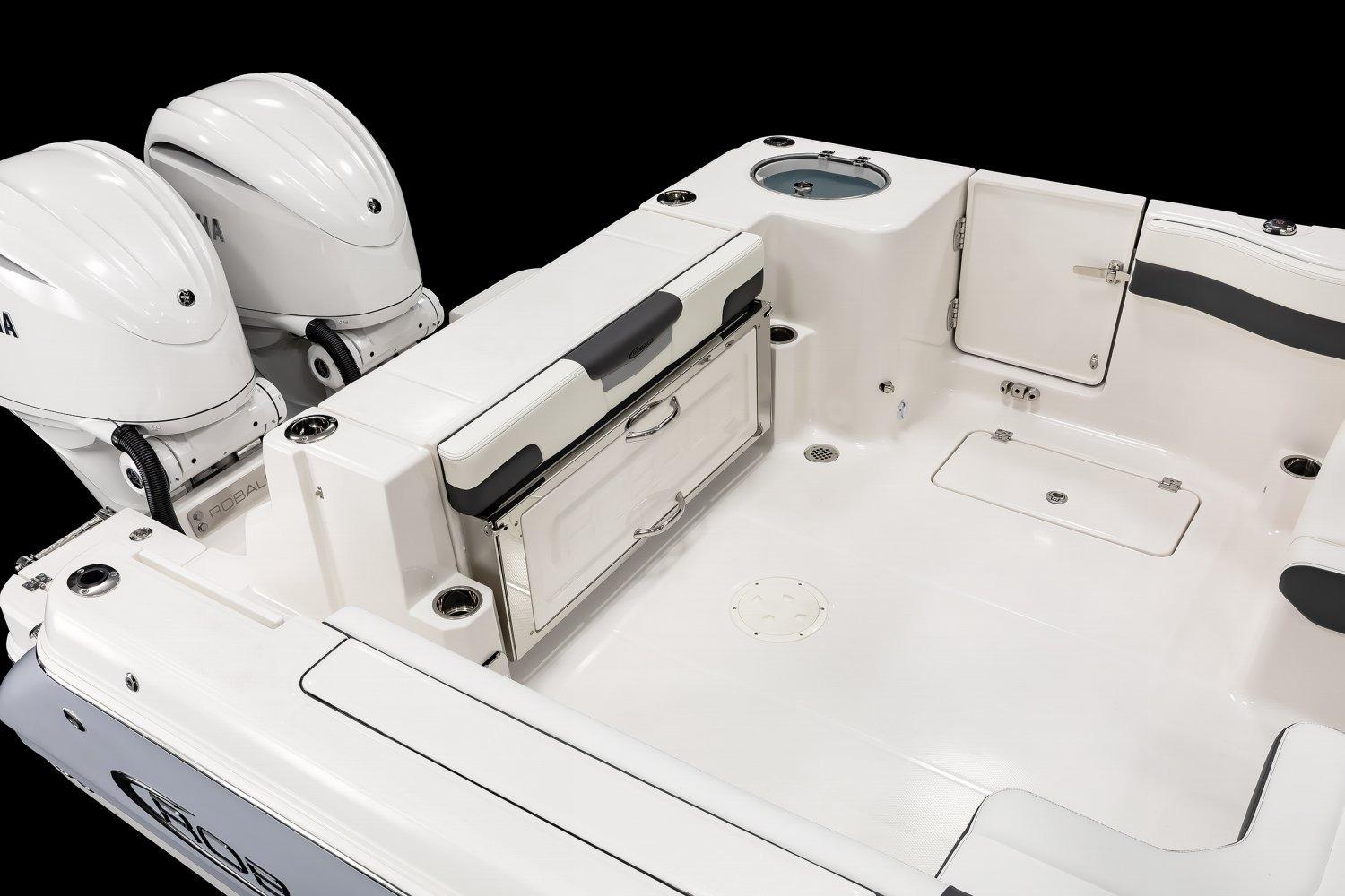 Manufacturer Provided Image: 2026 Robalo R277 Dual Console boat interior with twin engines and storage compartments.