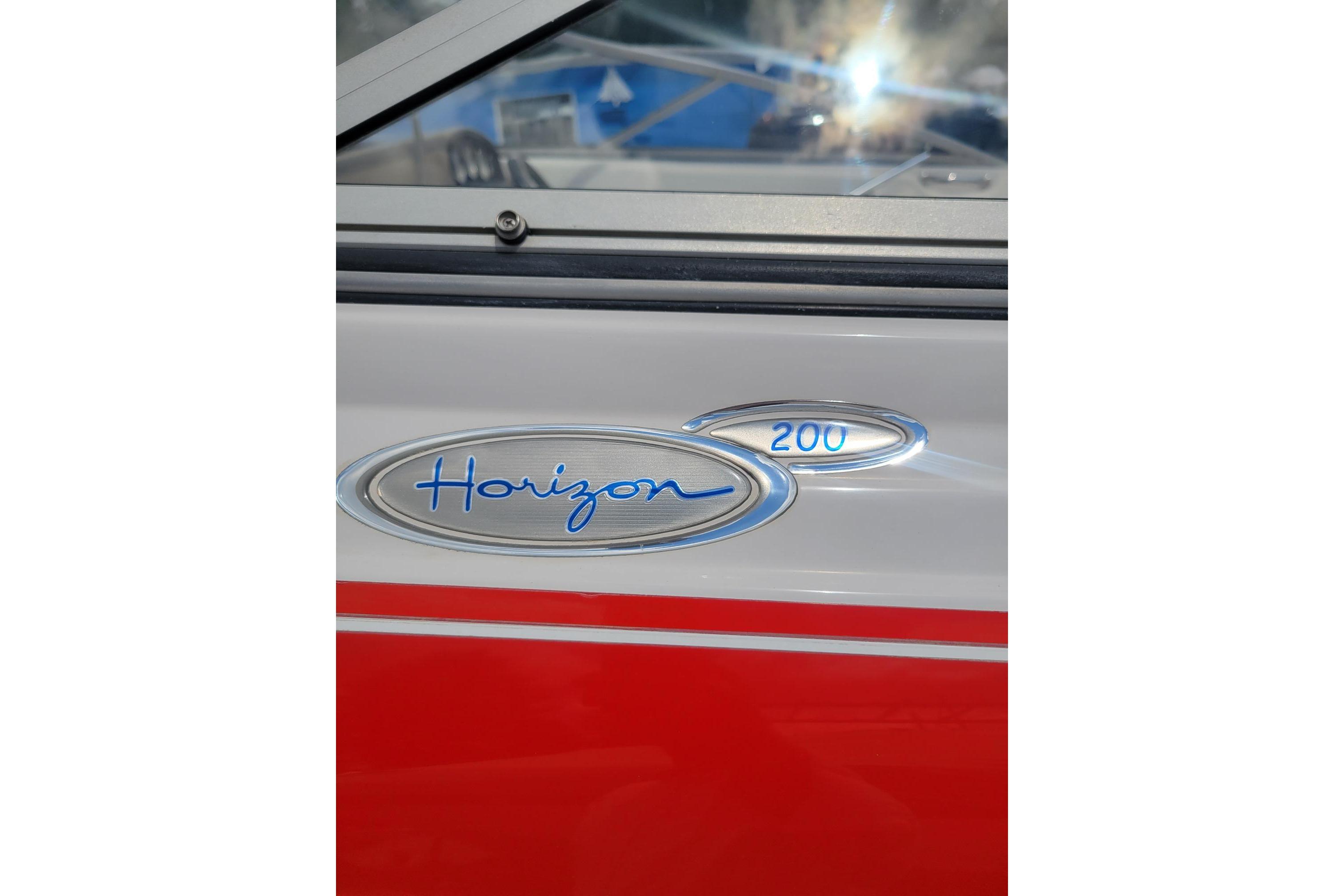 2007 Four Winns 200 Horizon boat emblem with red and white detailing.