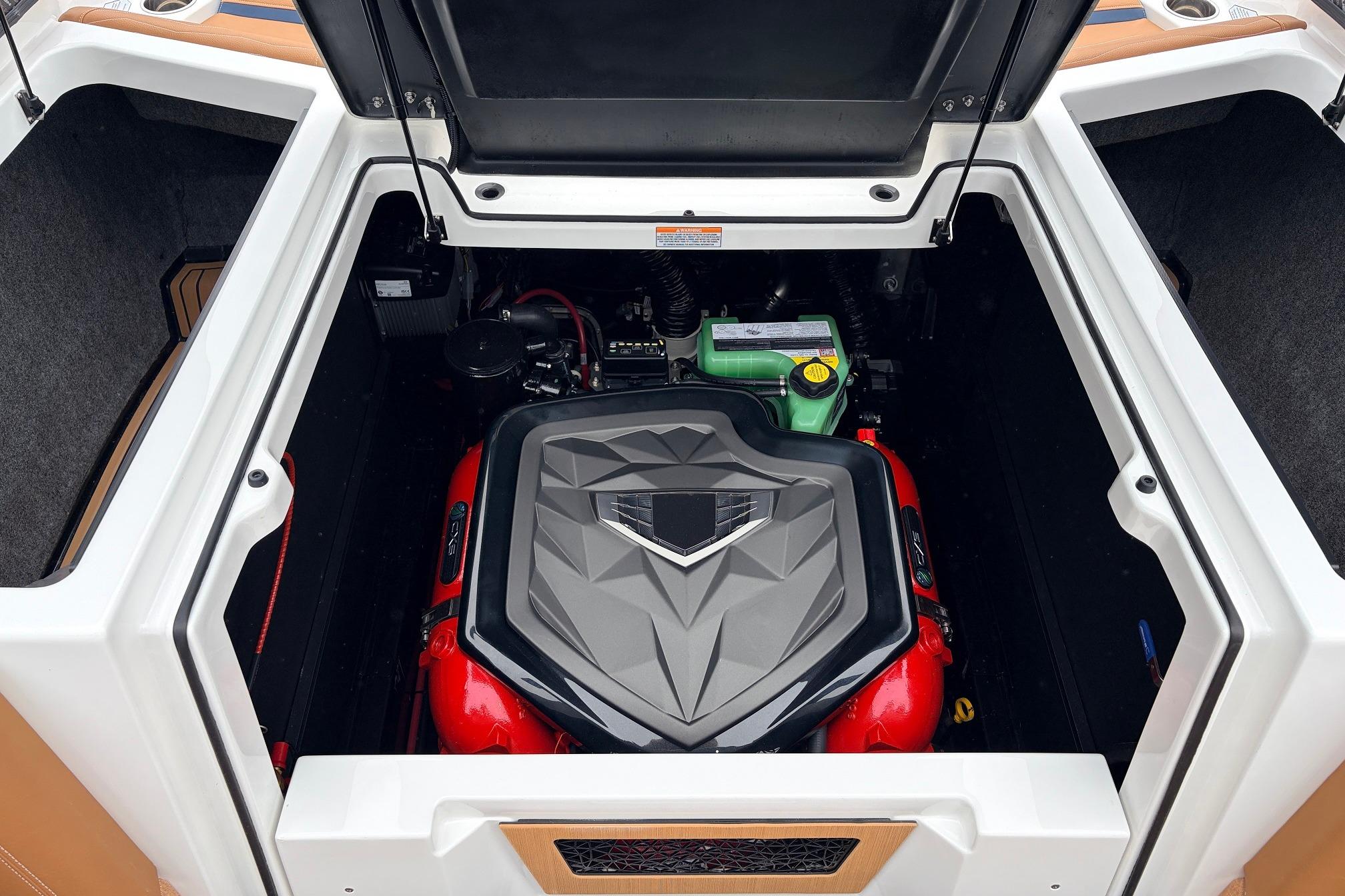 Engine compartment of 2026 Nautique Super Air Nautique G25 boat, showcasing modern design.
