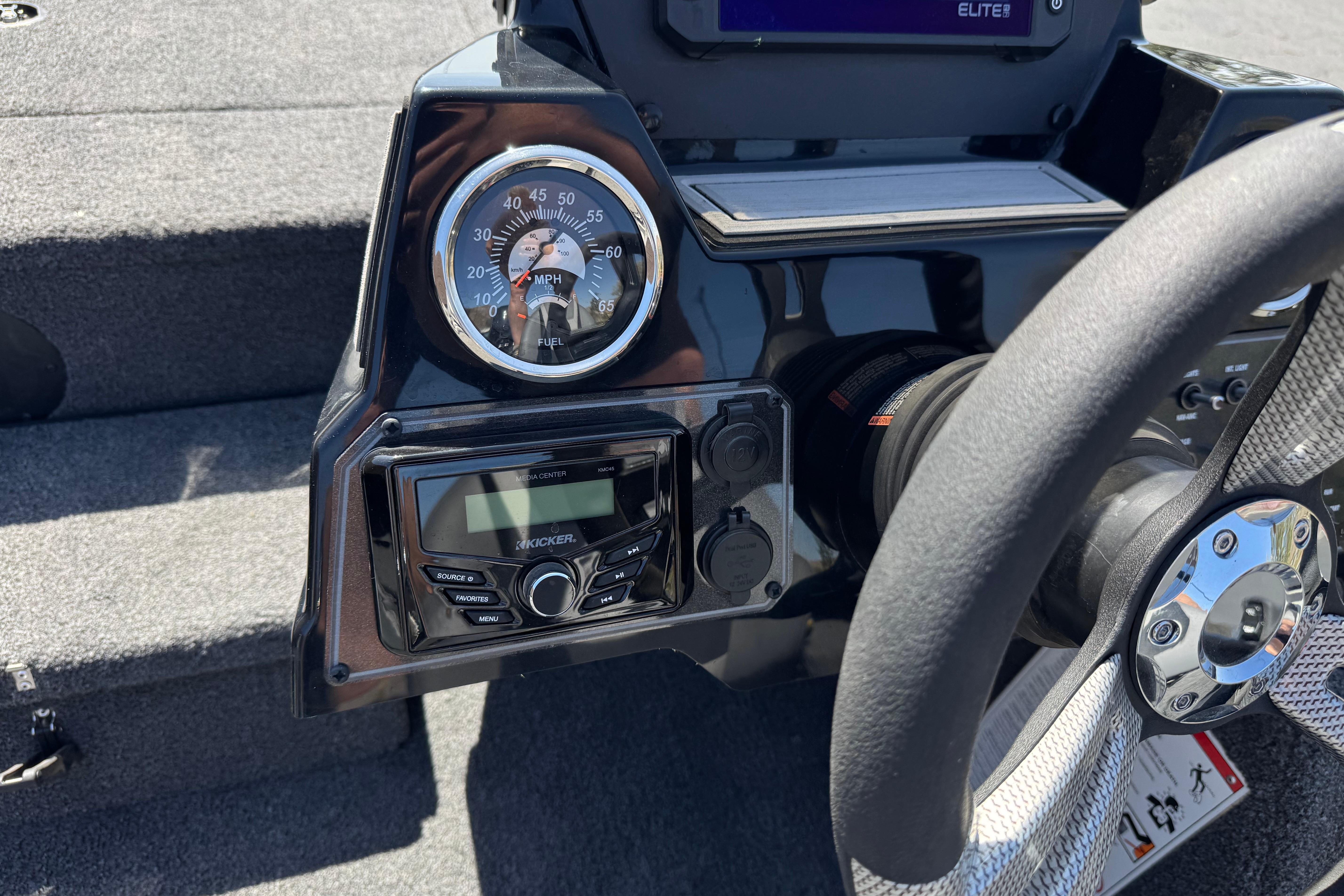 2024 Lowe Stinger 175 dashboard with speedometer, audio controls, and steering wheel.