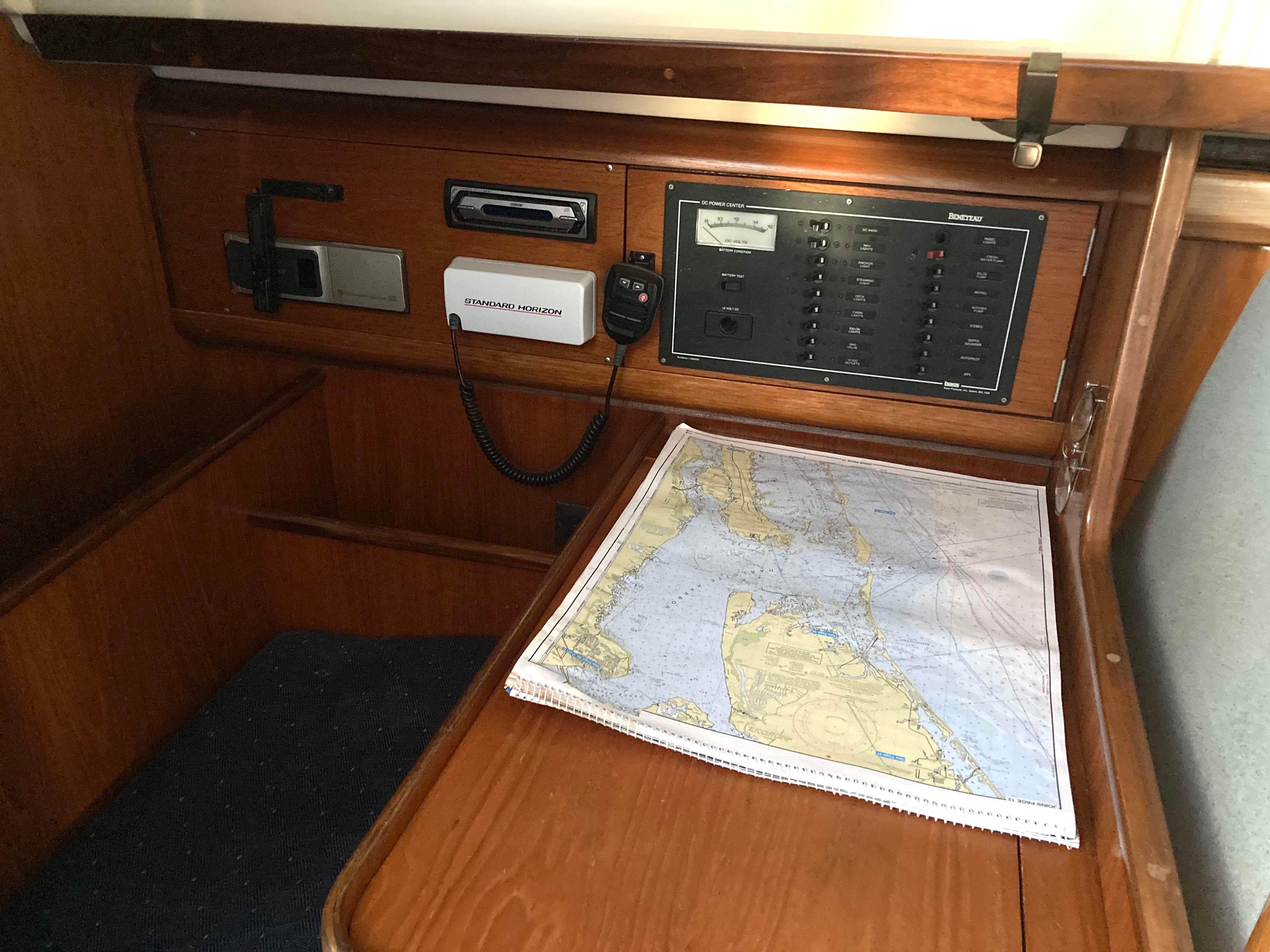Navigation station on 1993 Beneteau Oceanis 370 with map and control panel.