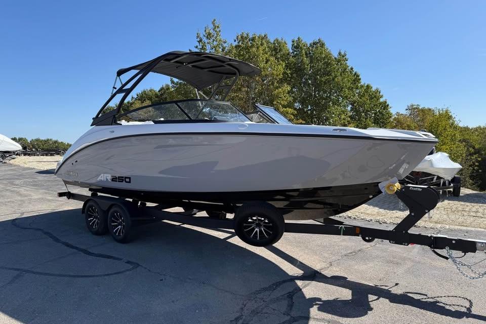 2026 Yamaha Boats AR250 on trailer, sleek design, parked outdoors.