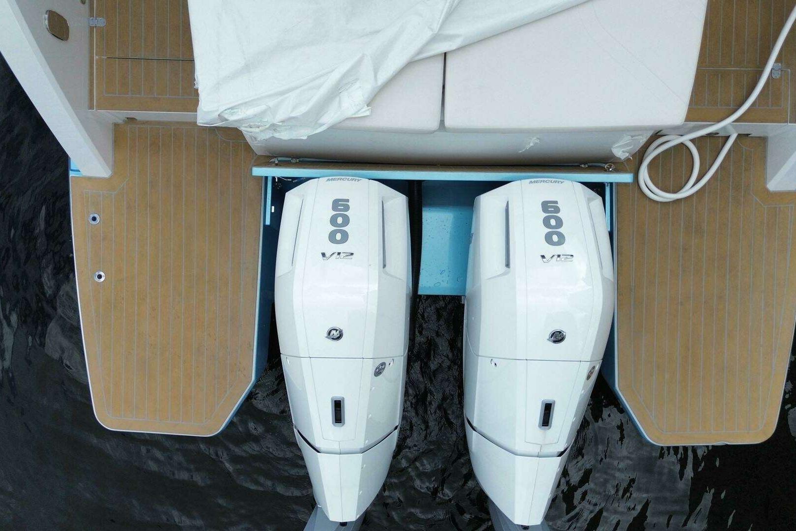 Top view of 2024 Fjord 41XP boat with twin Mercury 600 V12 engines.