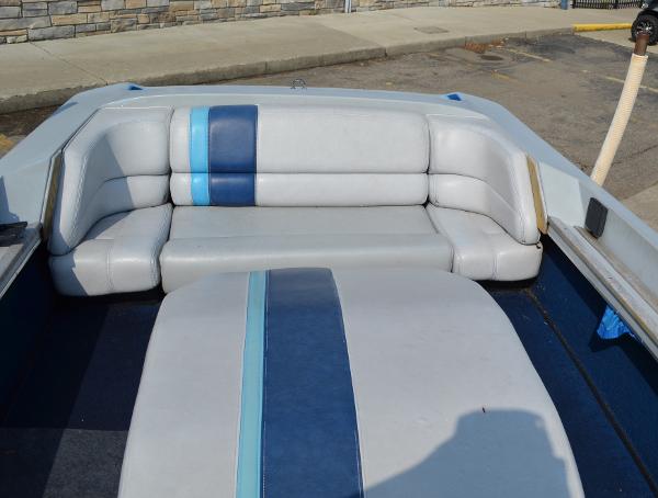 1989 Correct Craft Ski Nautique boat interior with blue and gray seating.