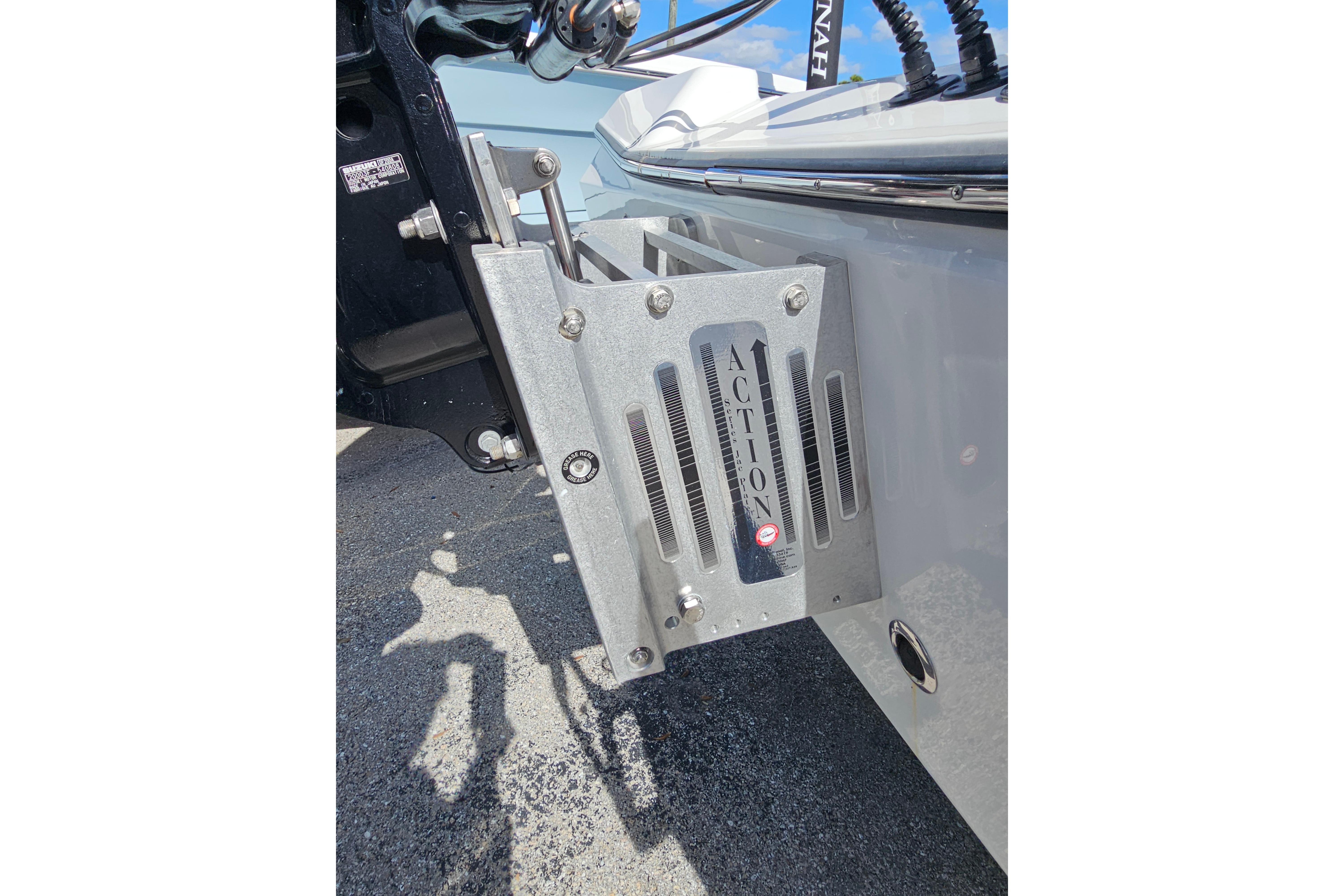 Close-up of 2025 Savannah 220 IS boat's motor mount with "Action" branding.