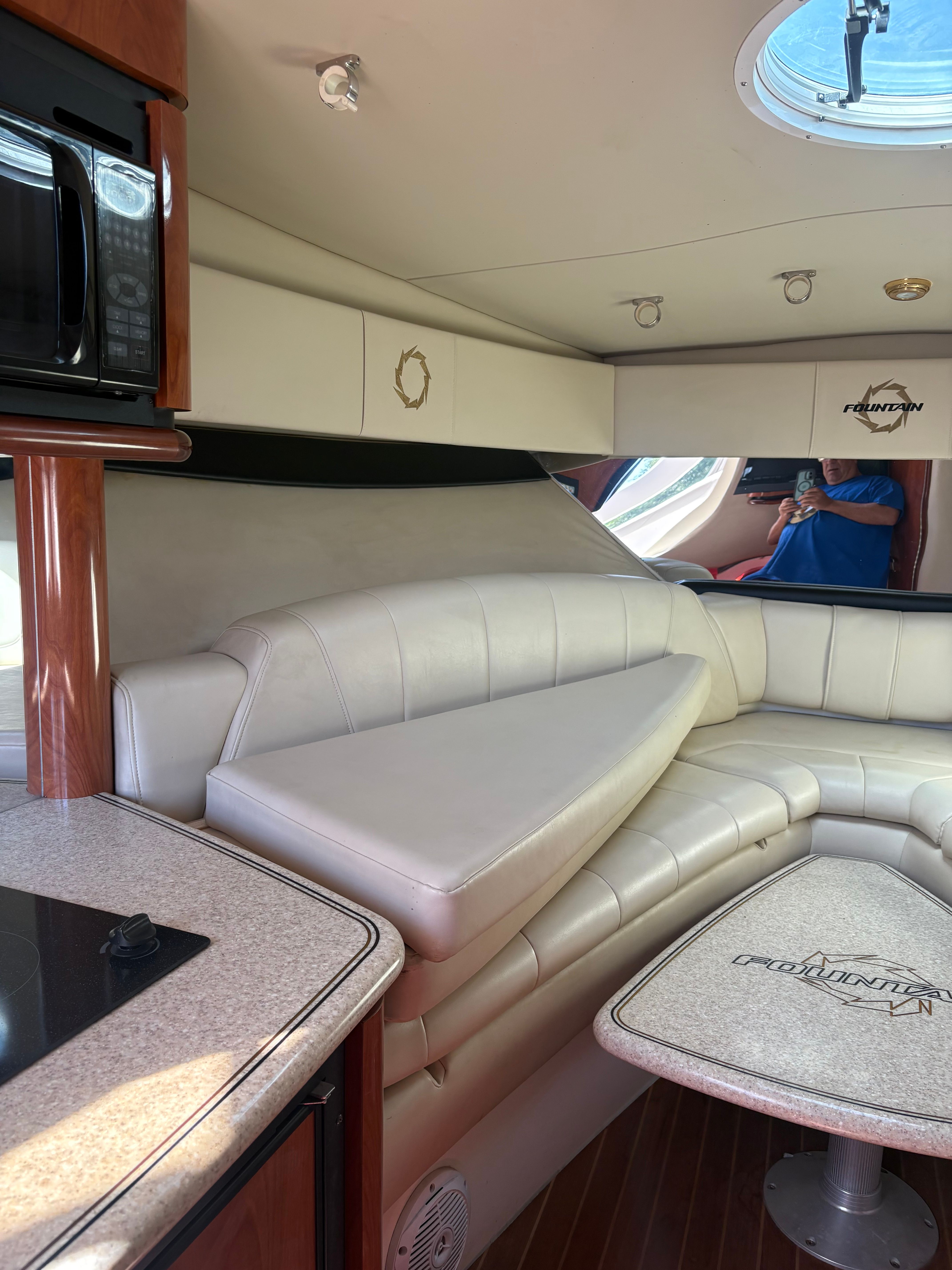 Interior of a 2009 Fountain 33 Sportfish Cruiser with leather seating.