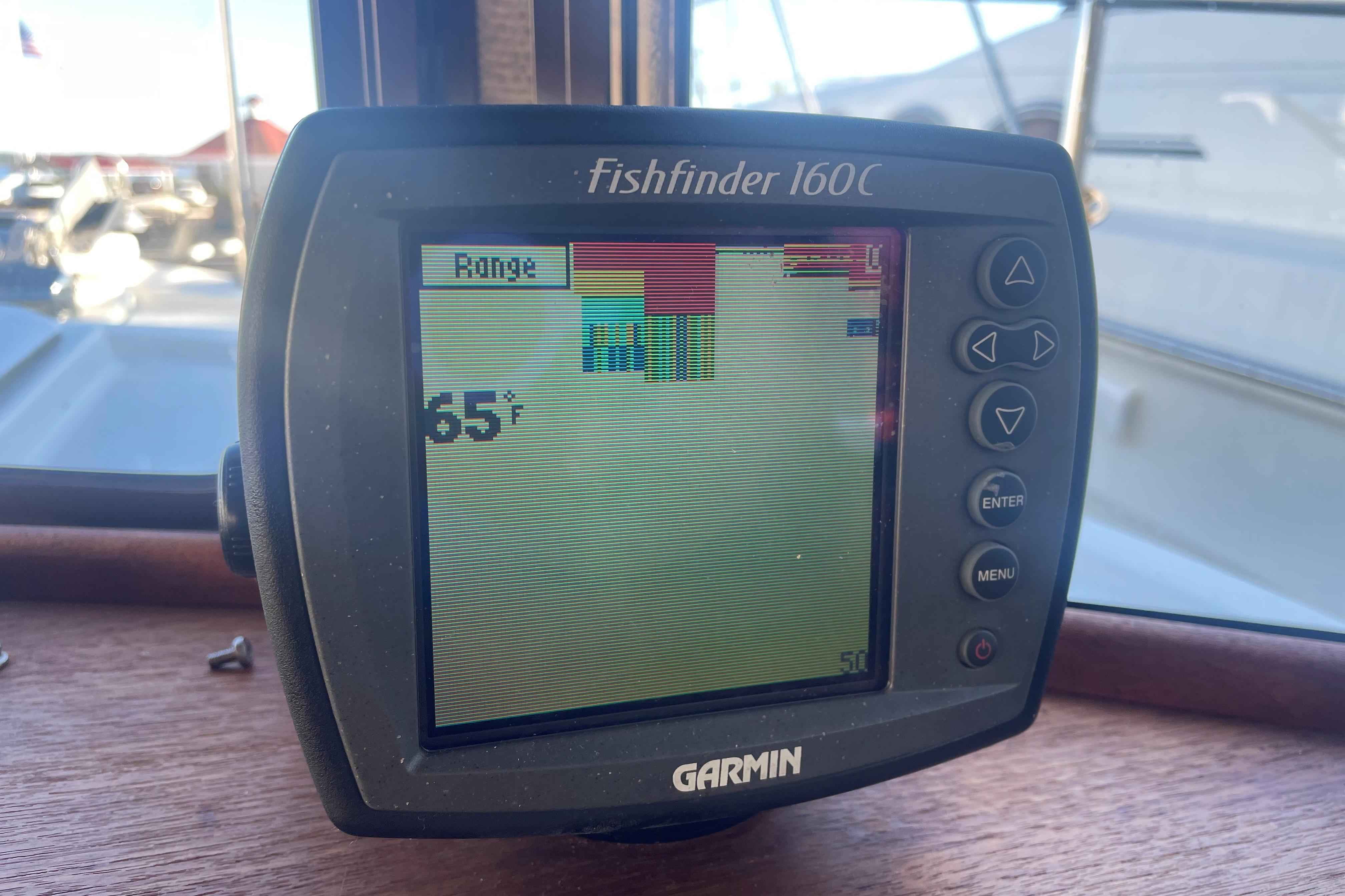 Garmin Fishfinder 160C display on 2007 Ranger Tugs R-25 boat, showing 65°F water temperature.