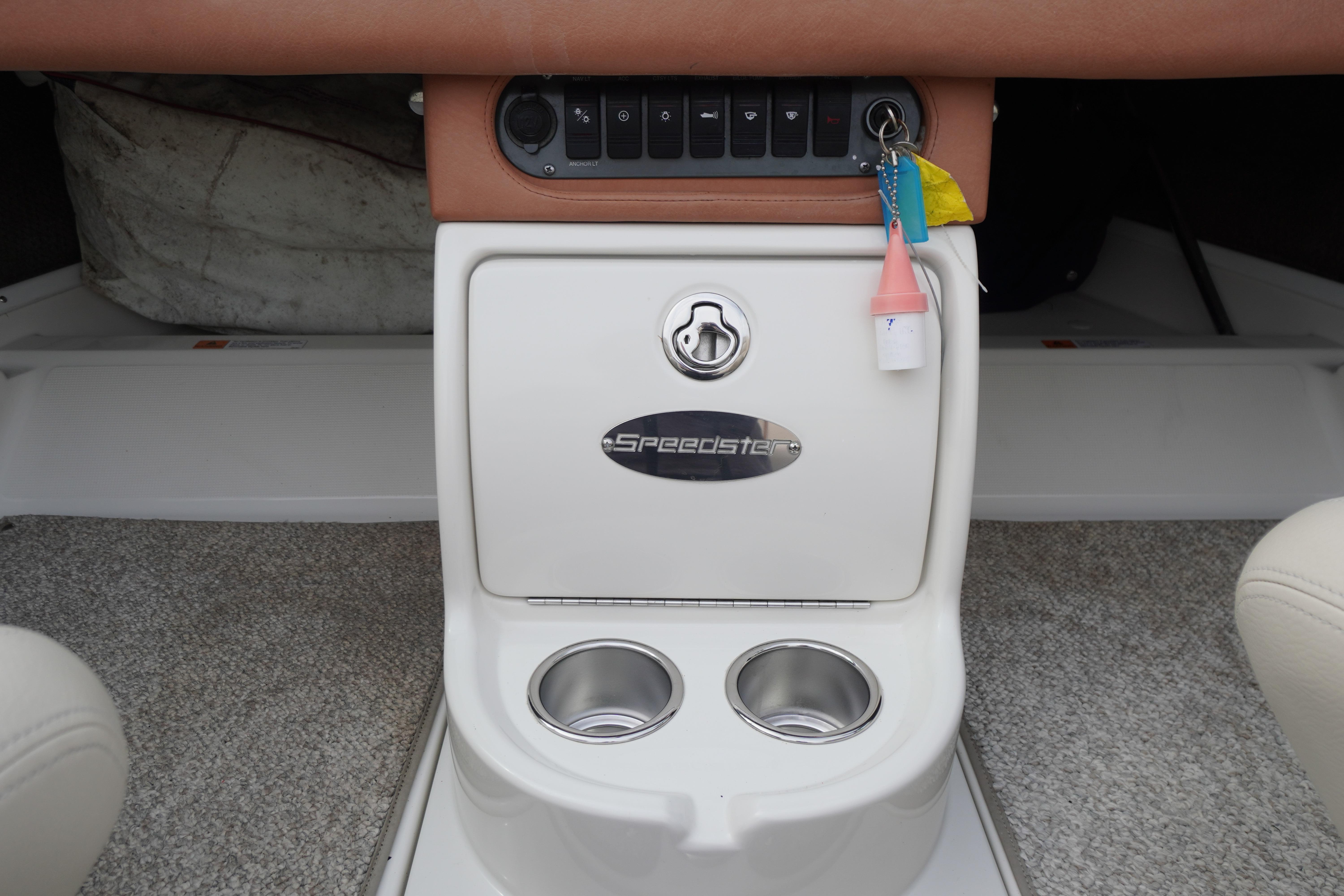 2005 Chris Craft Speedster Heritage dashboard with key ignition and cup holders.