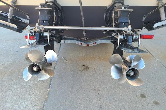 2002 Formula 330 Sun Sport boat with dual propellers on a trailer.