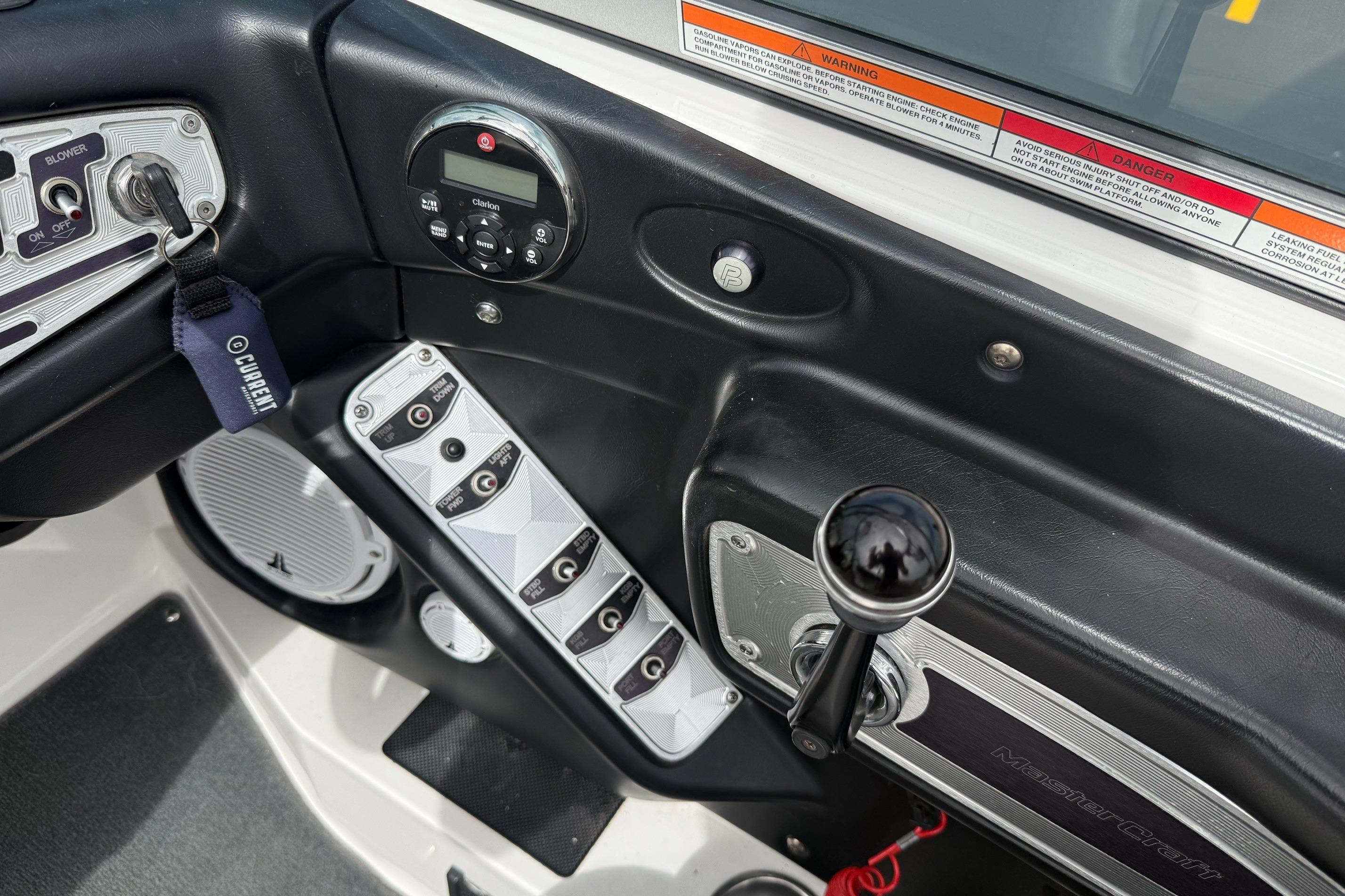 2008 MasterCraft X-15 boat dashboard with controls and audio system.