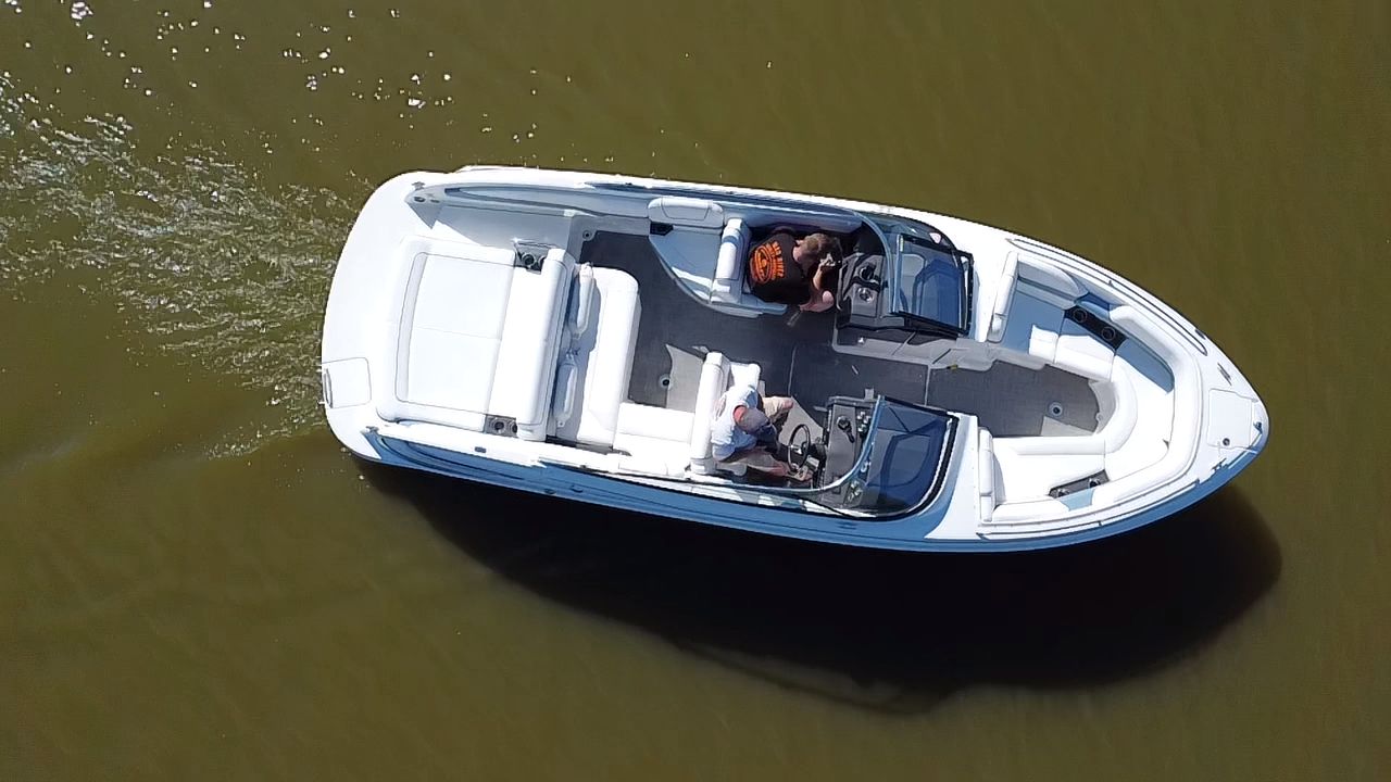 Aerial view of a 2019 Formula 240 boat on the water.