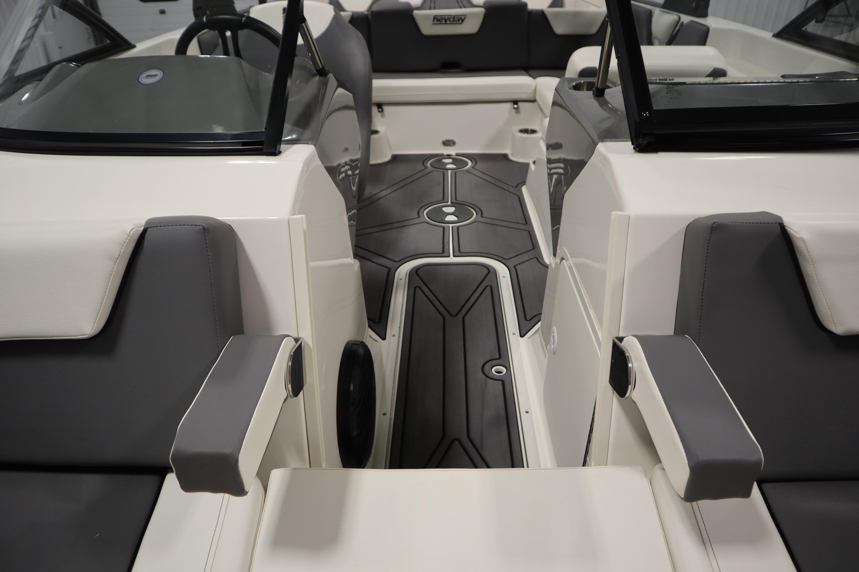 2023 Heyday WT Surf boat interior with gray and white seating and modern design.