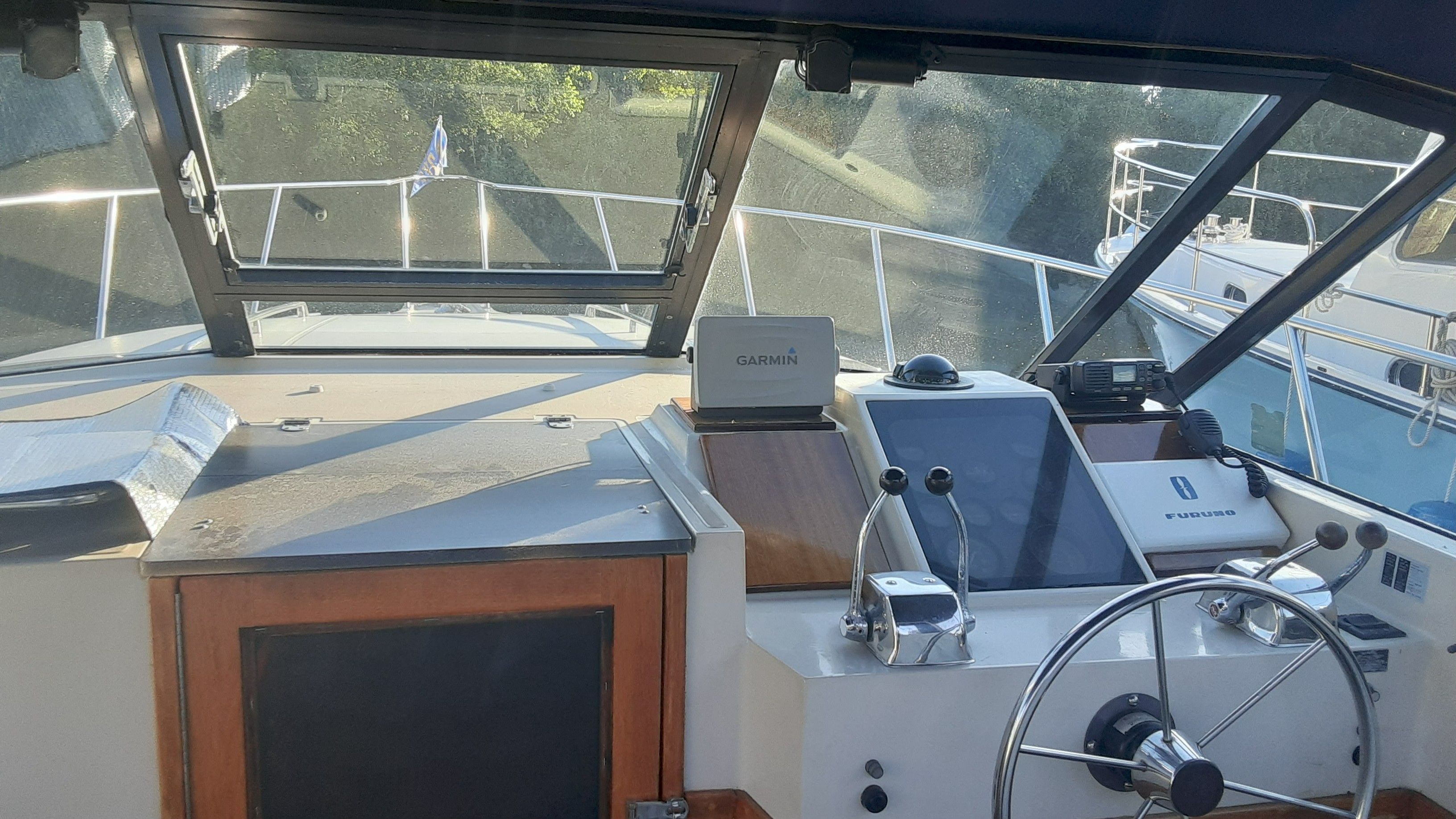 Interior view of 1985 Tiara Yachts 3100 Open helm.