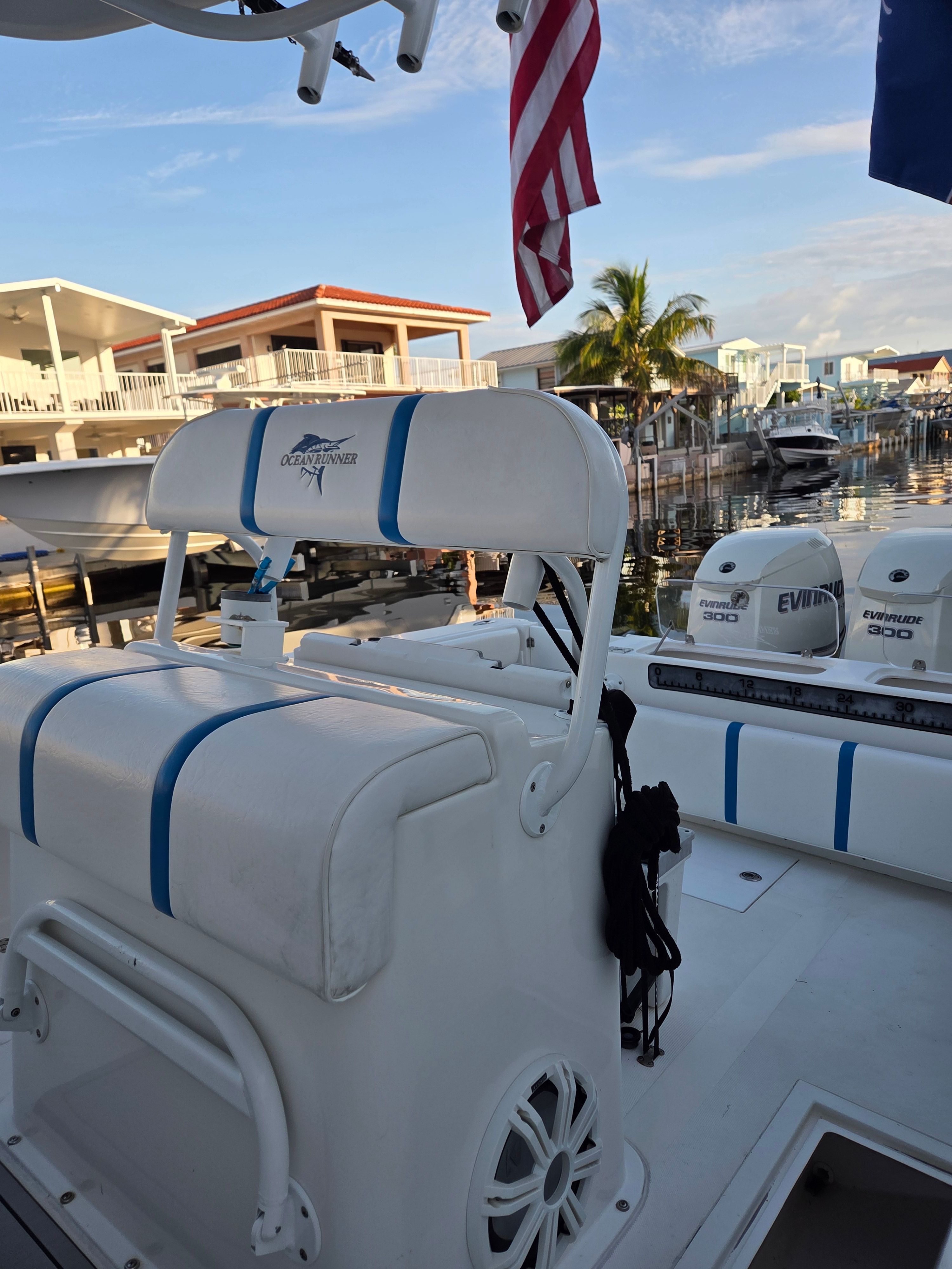 Ocean Runner 29 boat docked with Evinrude engines, 2012 model.