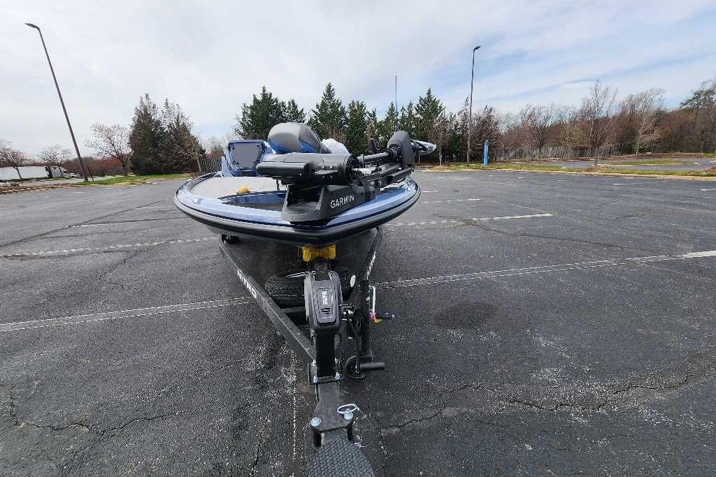 2026 Nitro Z18 Pro boat on trailer in empty parking lot.