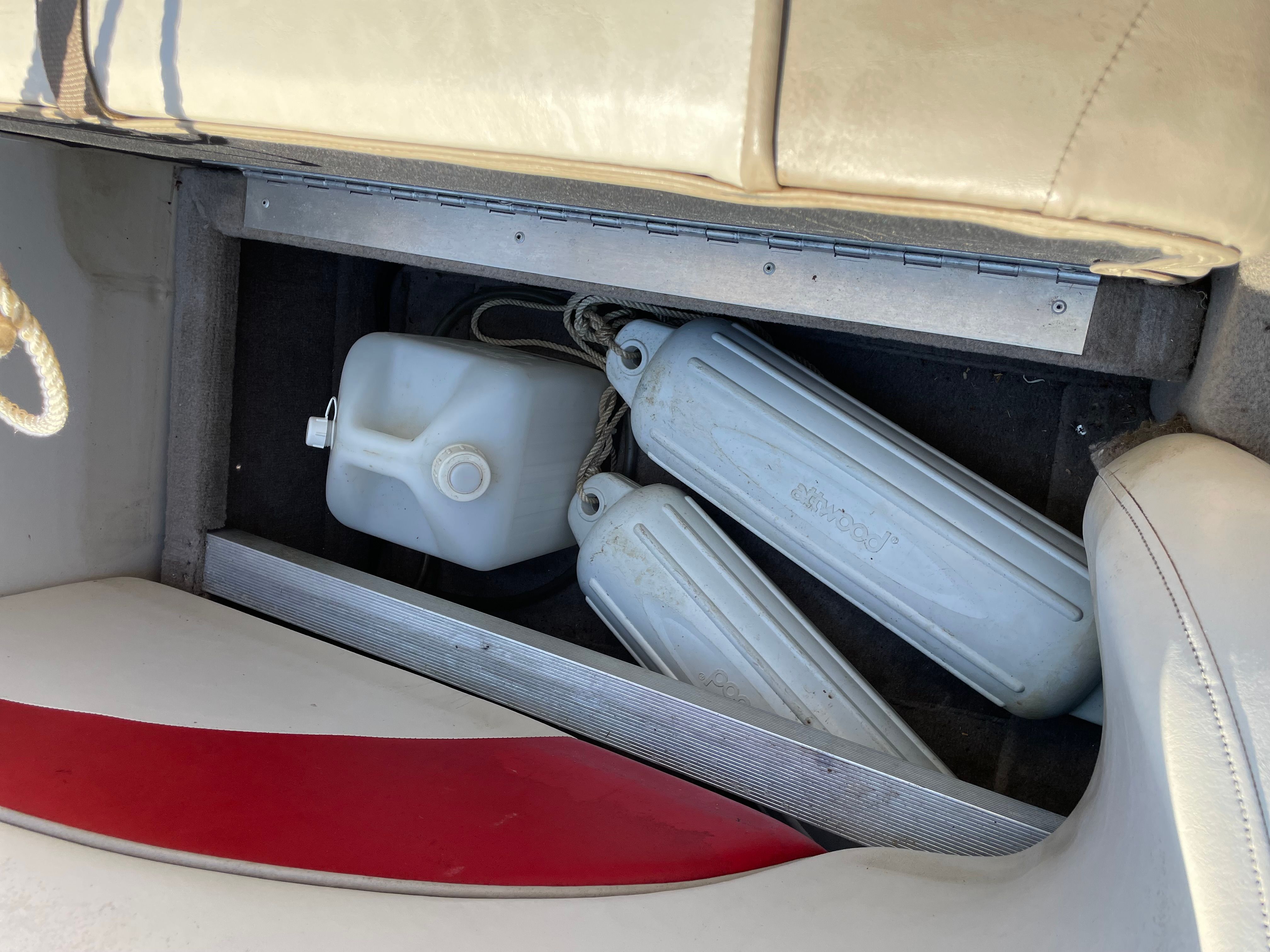 Storage compartment in 2005 Sun Tracker Party Deck 21 I/O boat.