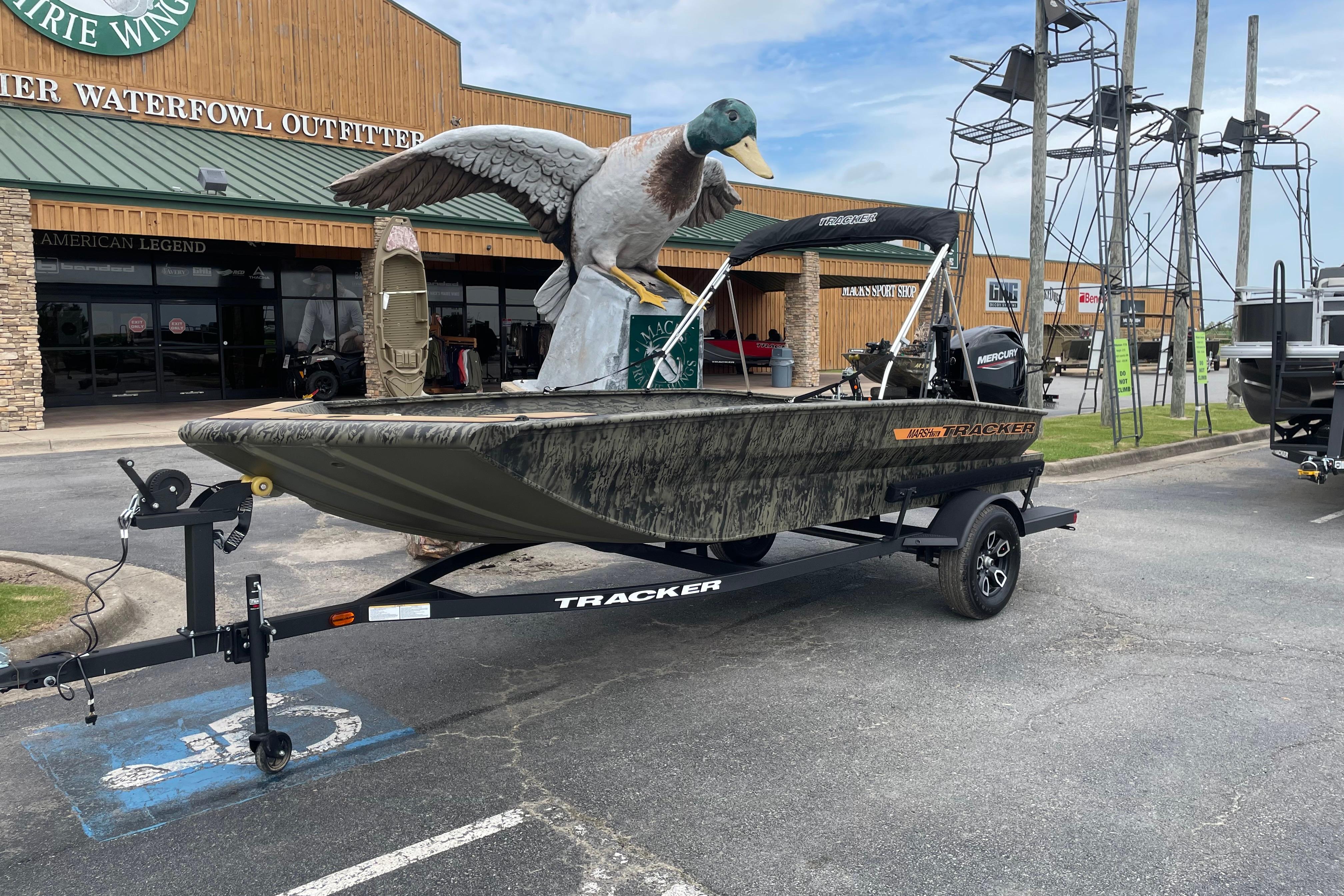 2026 Tracker Grizzly 1756 T Marsh boat displayed outside Prairie Wings store.